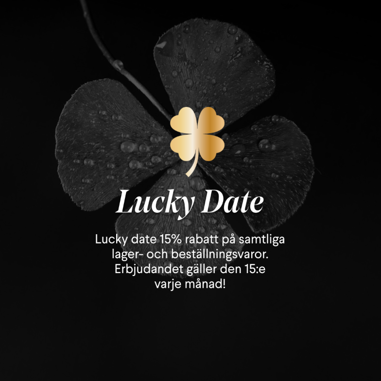 Promotional image: 'Lucky Date' with text offering '15% discount on all stock and custom items. The offer is valid on the 15th of every month!' The text is over a dark, water-droplet-covered four-leaf clover with a golden clover icon, all on a black background.