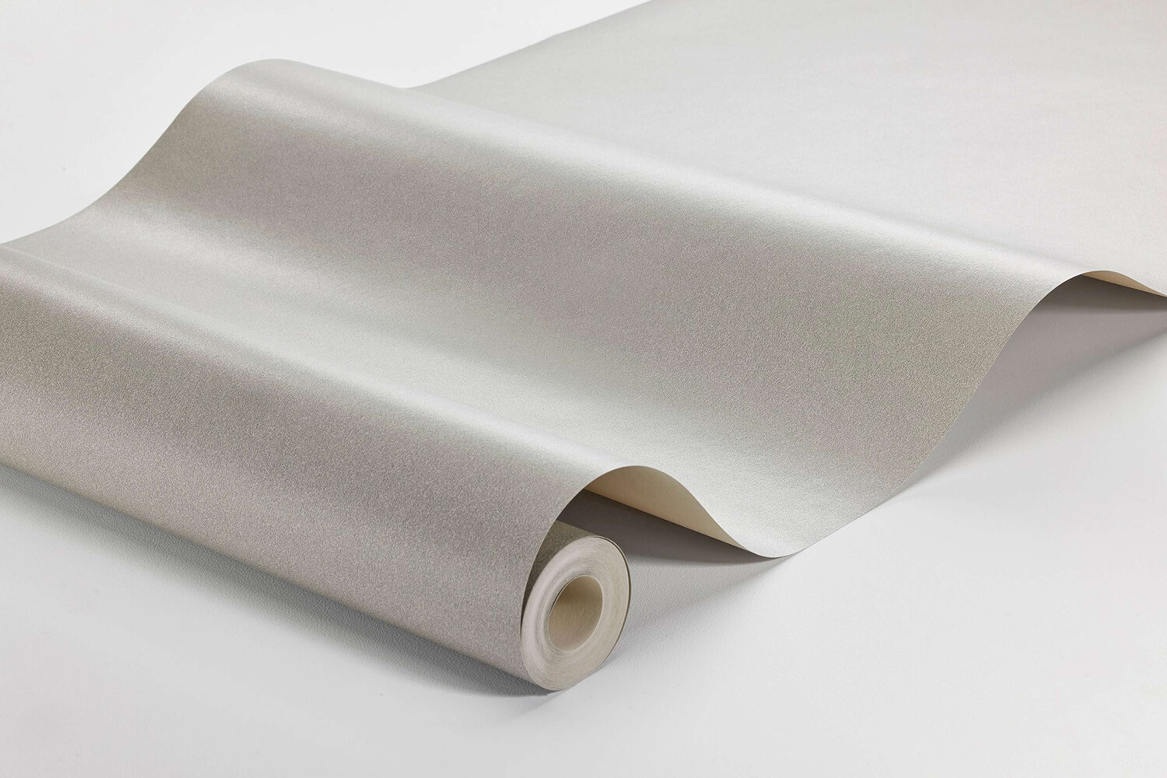 Space Sand tapet enfärgad i beige. Från kollektionen Pigment. Nonwoven-material.