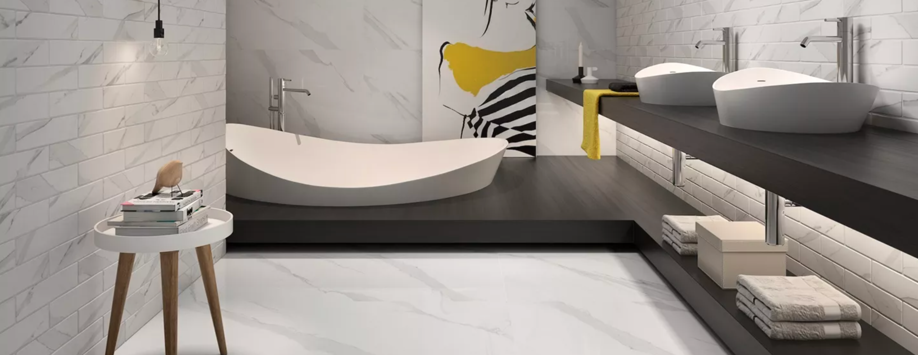 Sleek modern bathroom with white marble-look tiles, a freestanding tub, and a dark double vanity.