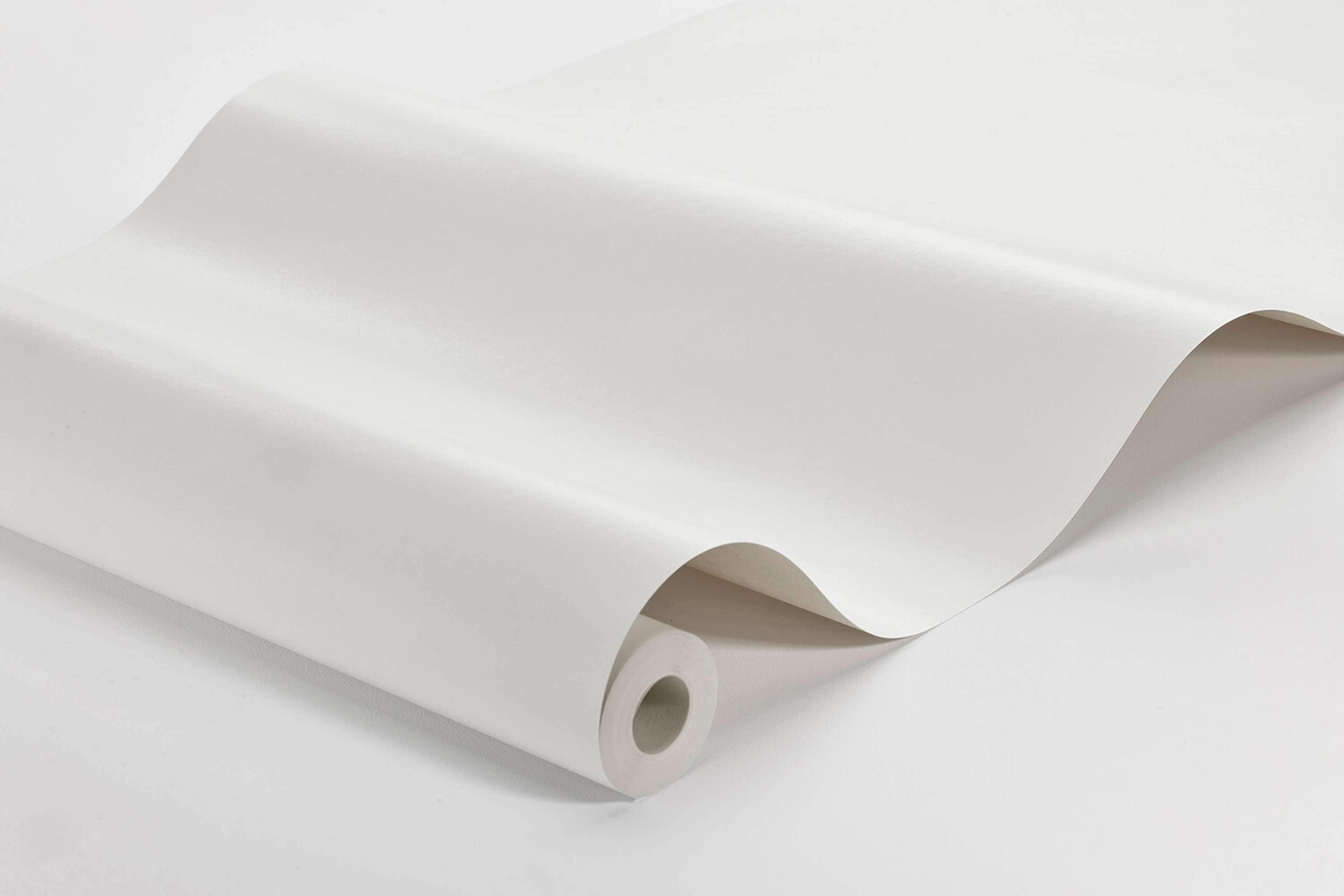 Bright White tapet enfärgad i vit. Från kollektionen Pigment. Nonwoven-material.