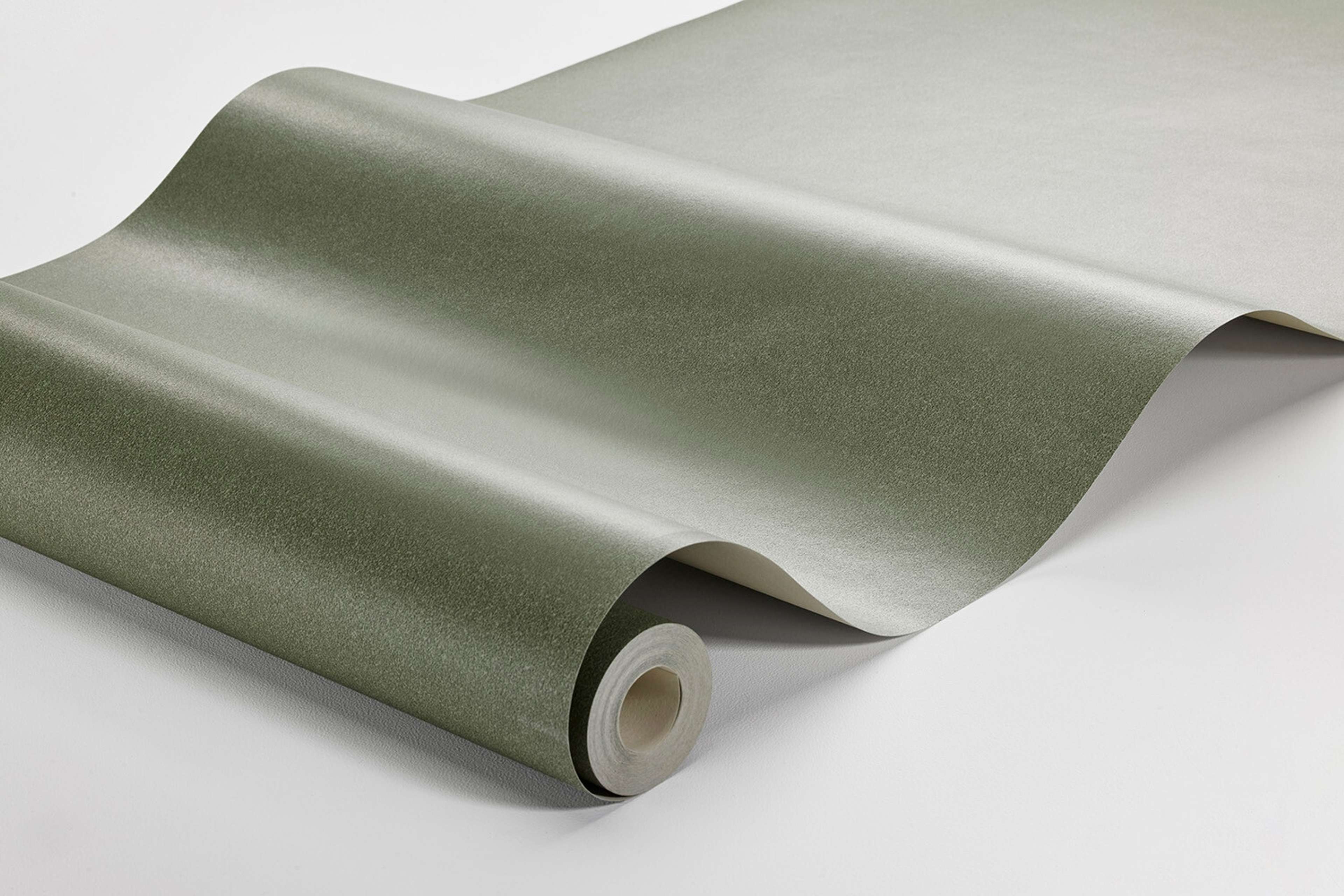 Emerald Sand tapet enfärgad i grön. Från kollektionen Pigment. Nonwoven-material.