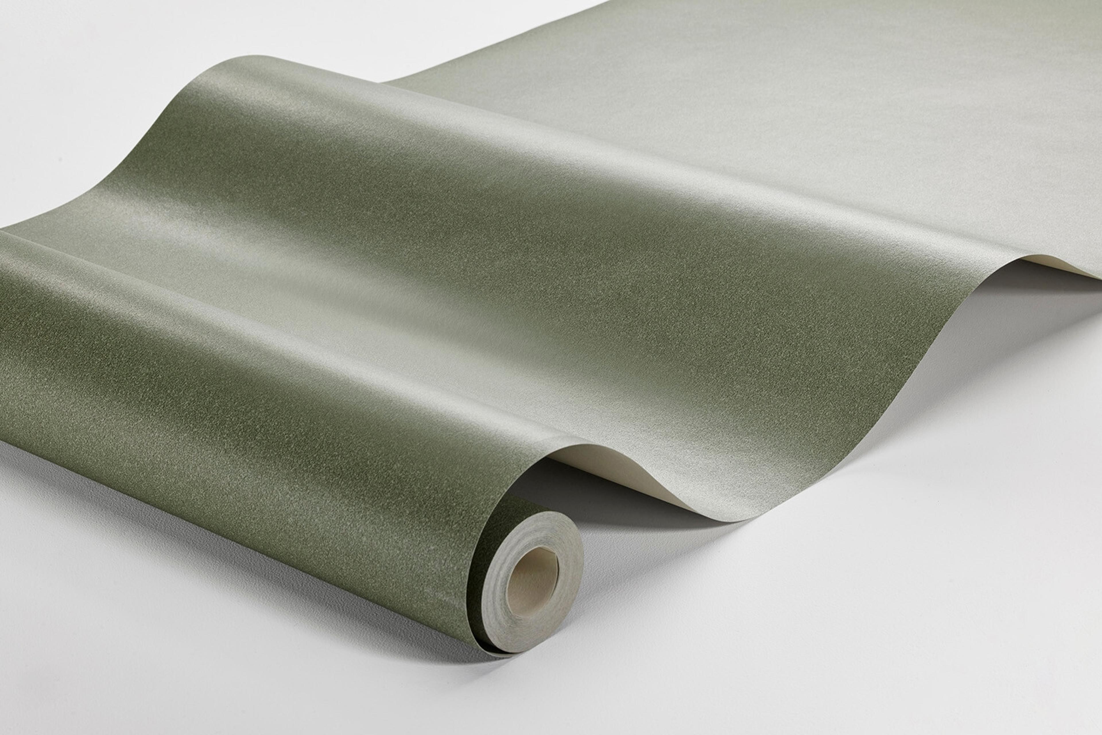 Emerald Sand tapet enfärgad i grön. Från kollektionen Pigment. Nonwoven-material.