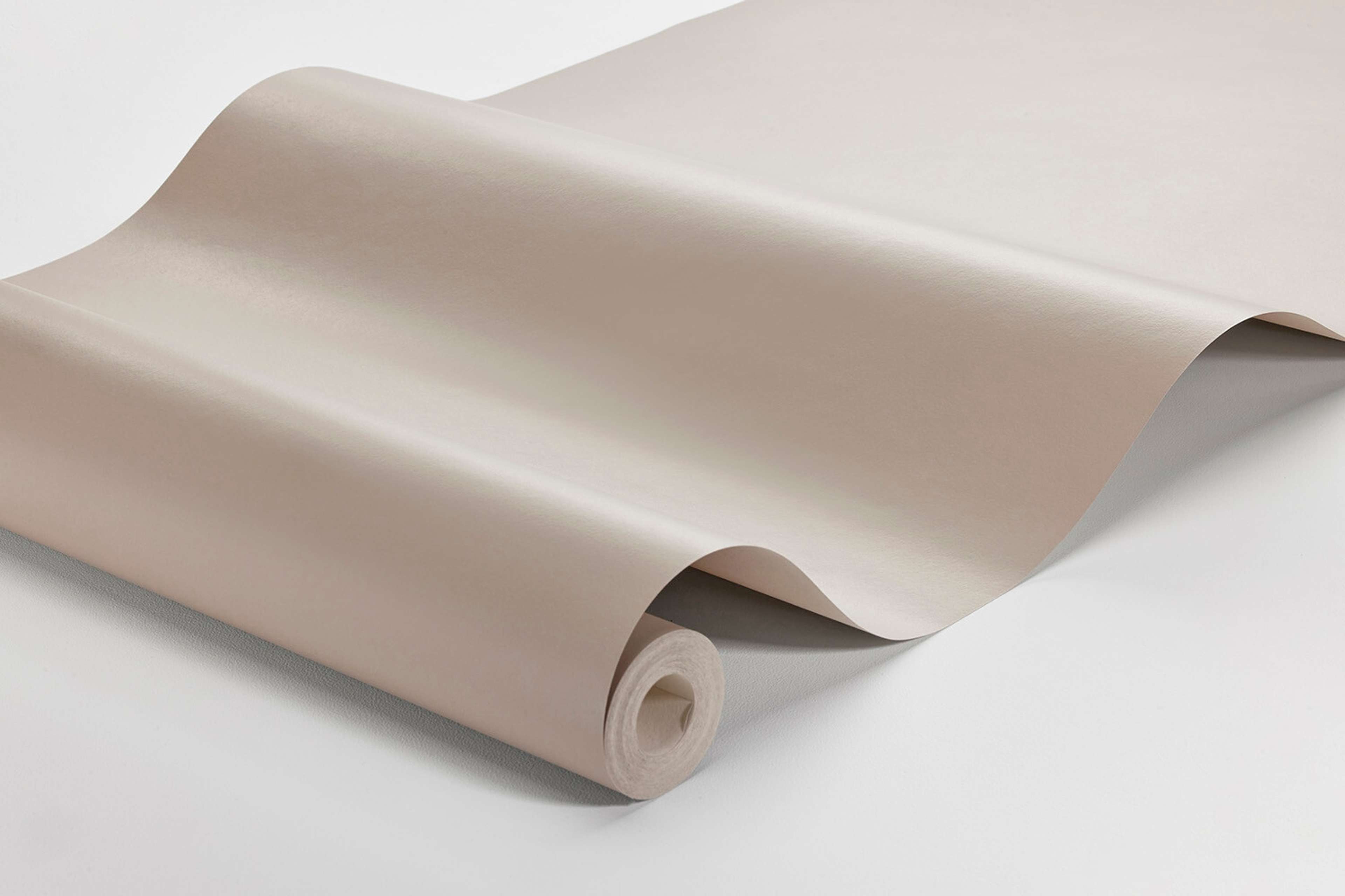 Portabello tapet enfärgad i beige. Från kollektionen Pigment. Nonwoven-material.