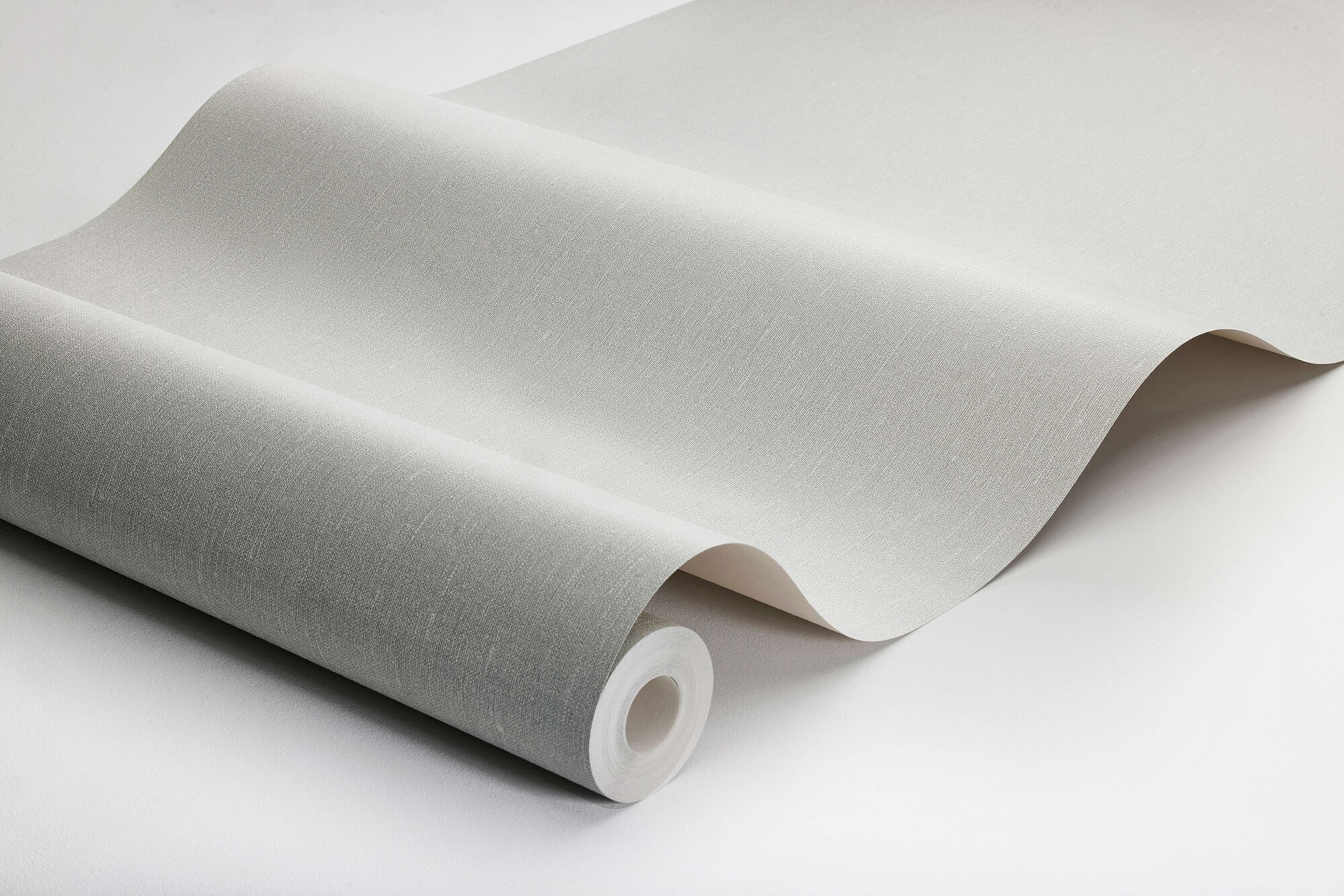 Sage Green tapet med enfargat, textilimitation mönster i grön. Från kollektionen Linen. Nonwoven-material. Passar i vardagsrum och matsal.
