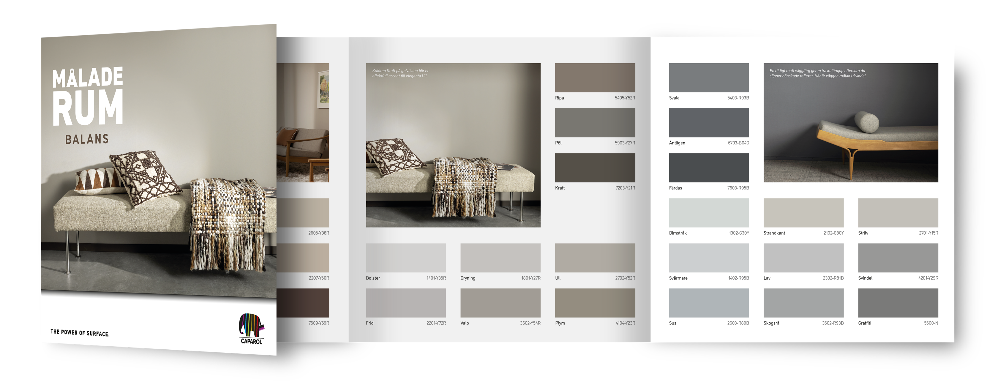 Open paint catalog displaying swatches of neutral and gray paint colors with example room interiors.