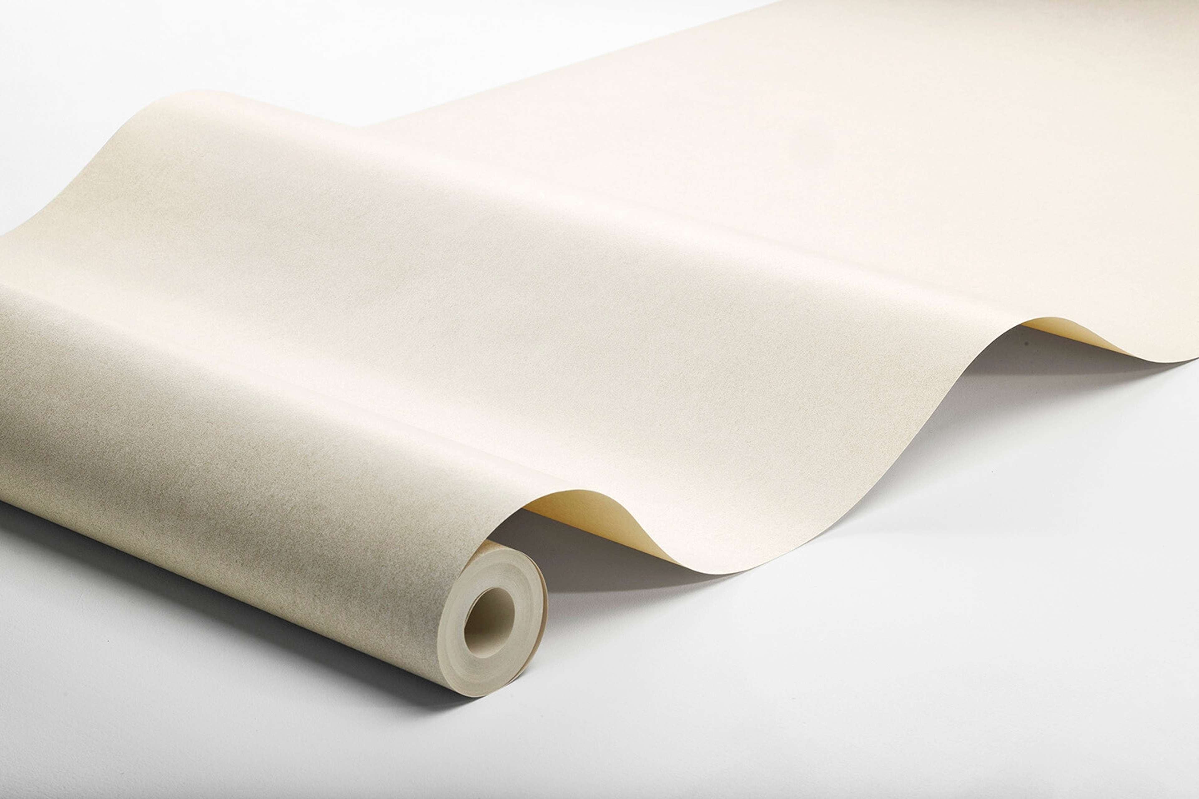 Shades Dolomite tapet enfärgad i beige. Från kollektionen shades. Nonwoven-material. Passar i vardagsrum.