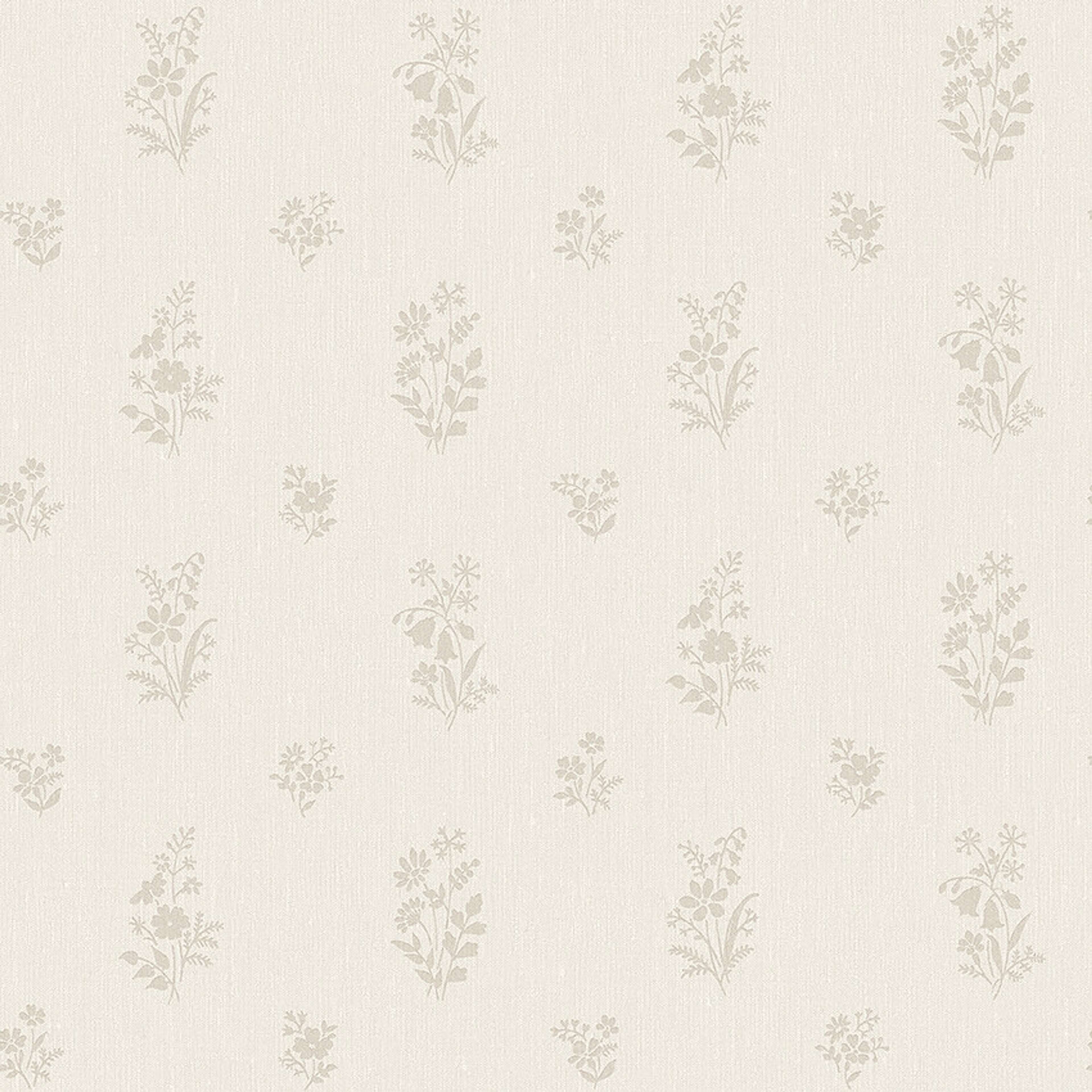 Petit Fleurs tapet tapet med blommigt mönster i beige. Från kollektionen Dreamy Escape. Nonwoven-material med rak passning. Passar i vardagsrum och matsal.