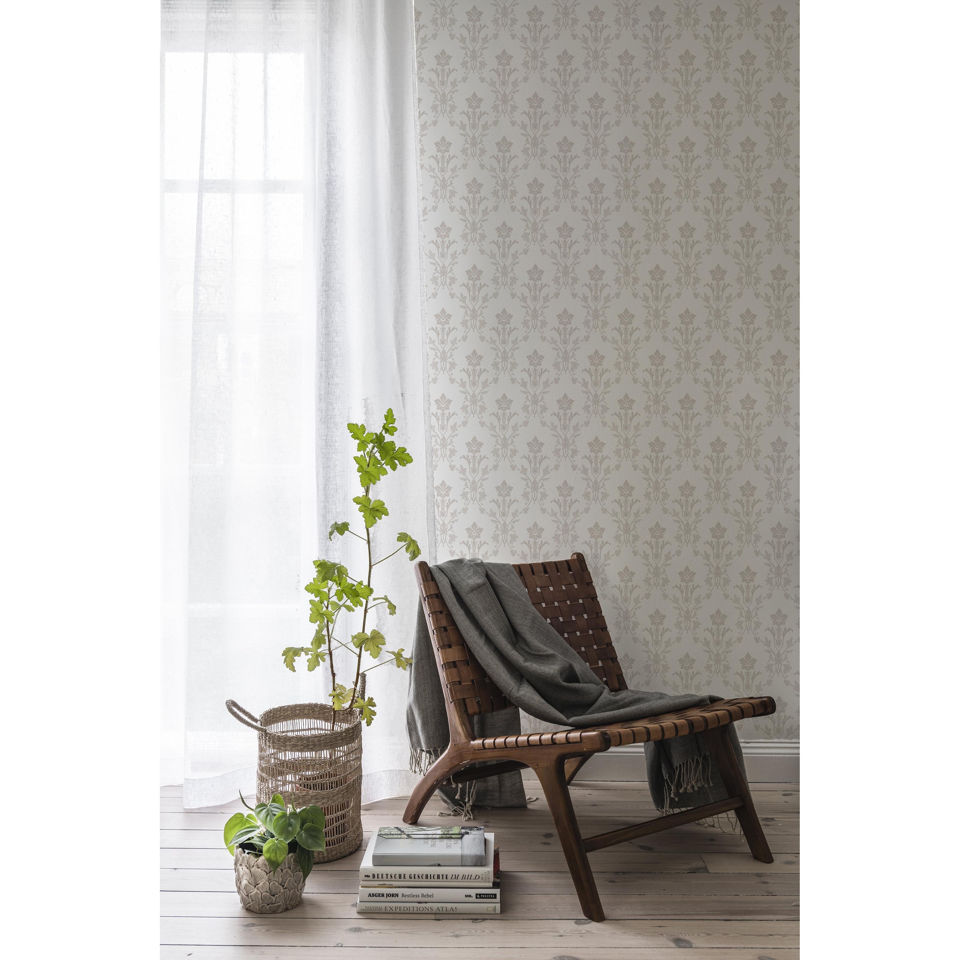 Hudiksvalls teater, vit tapet med medaljonger mönster i vit. Från kollektionen Blommor & Blad. Nonwoven-material med rak passning.