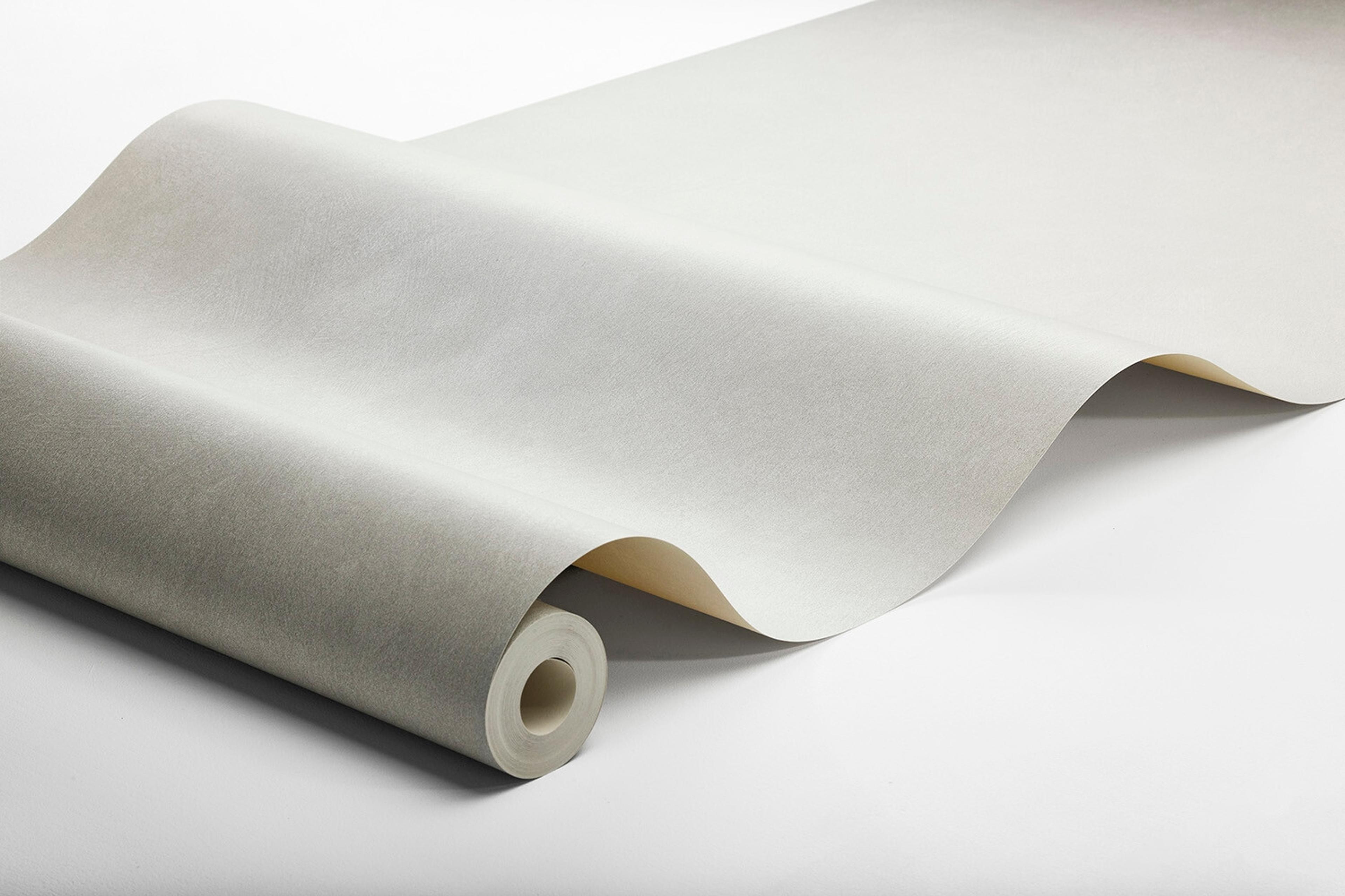 Shades Soapstone tapet enfärgad i grå. Från kollektionen shades. Nonwoven-material. Passar i hall.