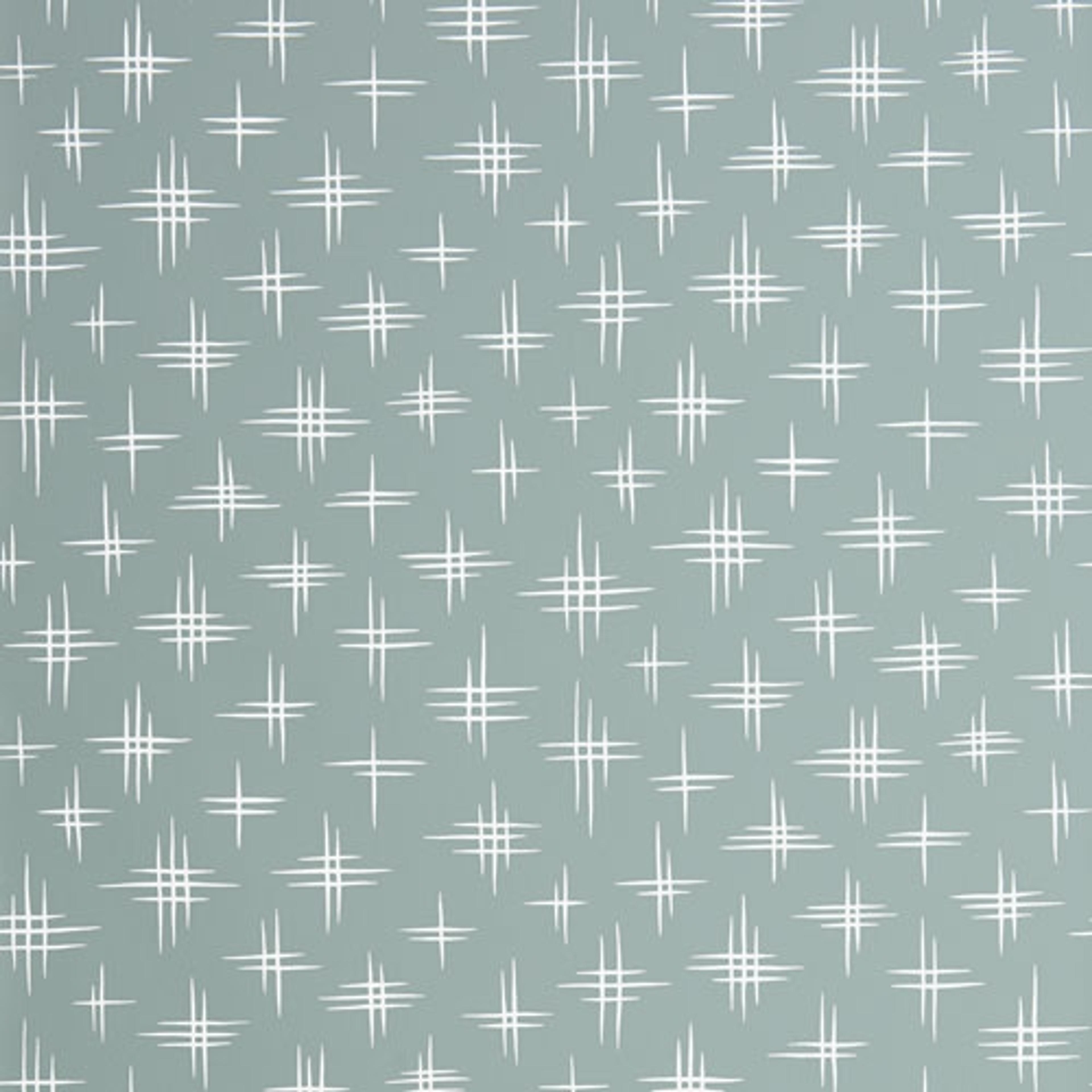 Limelight Lantern tapet från Midbec med himmel mönster i turkos. Från kollektionen Pioneer. Nonwoven-material med förskjuten passning.