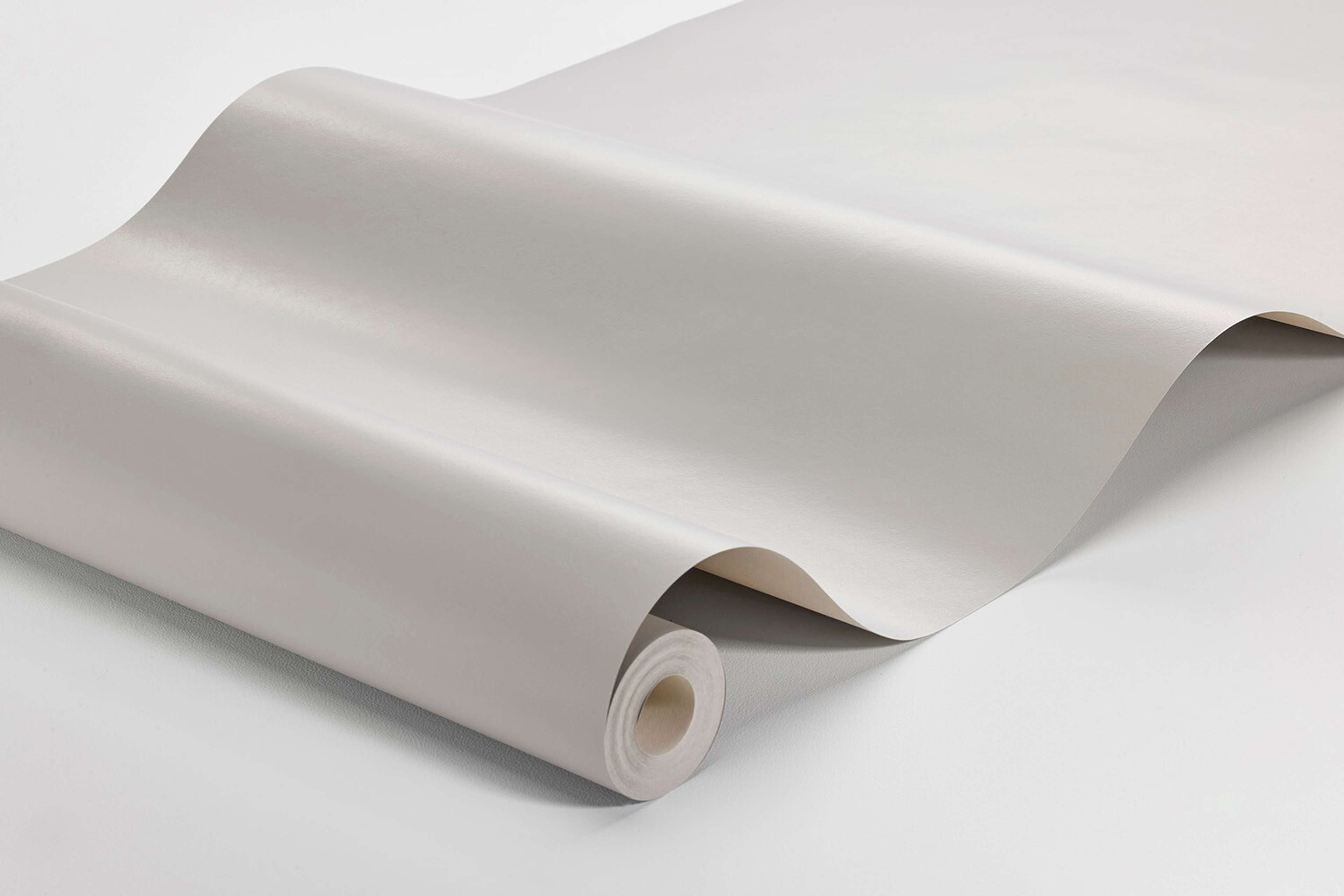 Stone Grey tapet enfärgad i grå. Från kollektionen Pigment. Nonwoven-material.