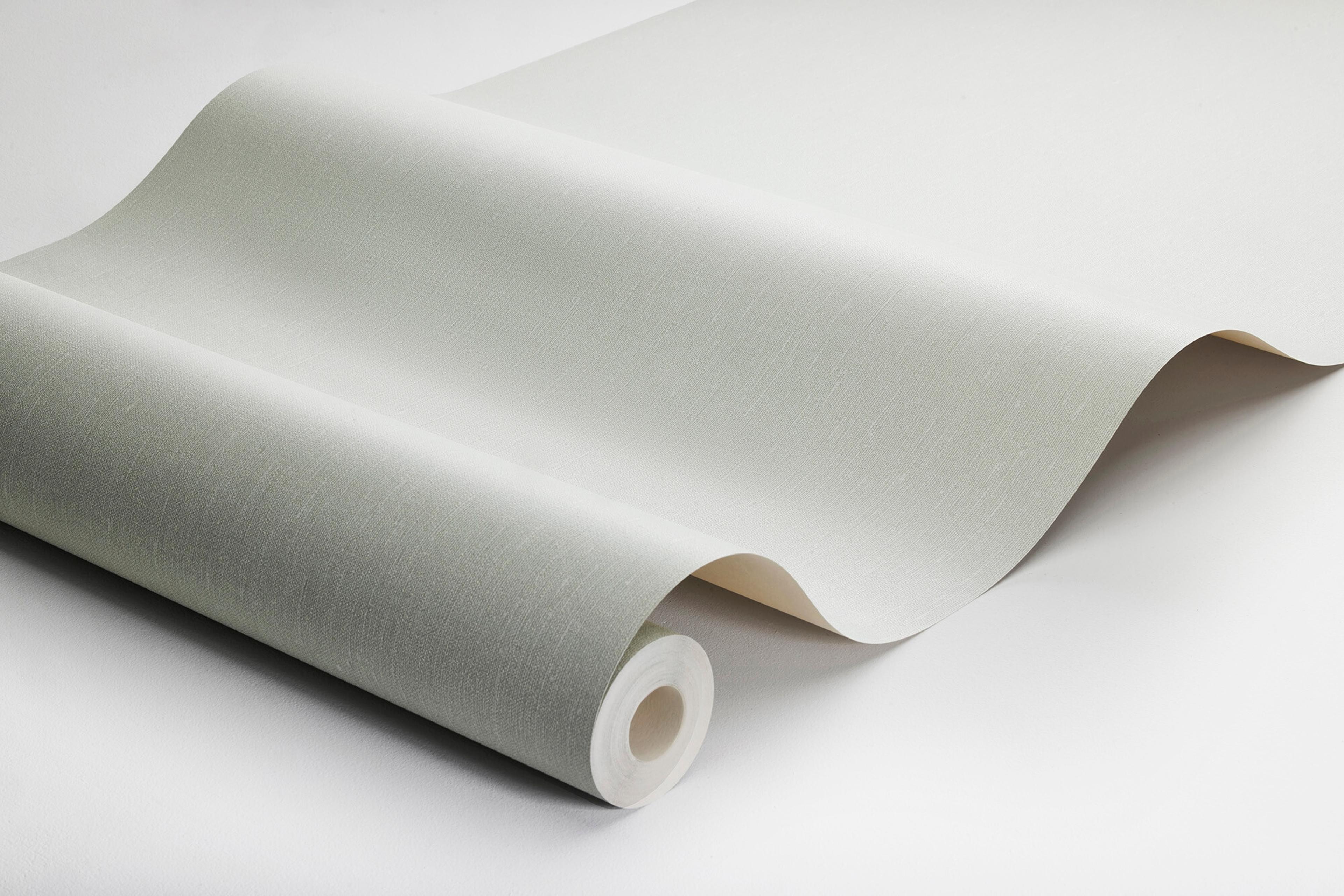 Soft Jade tapet med enfargat, textilimitation mönster i grön. Från kollektionen Linen. Nonwoven-material. Passar i vardagsrum och matsal.