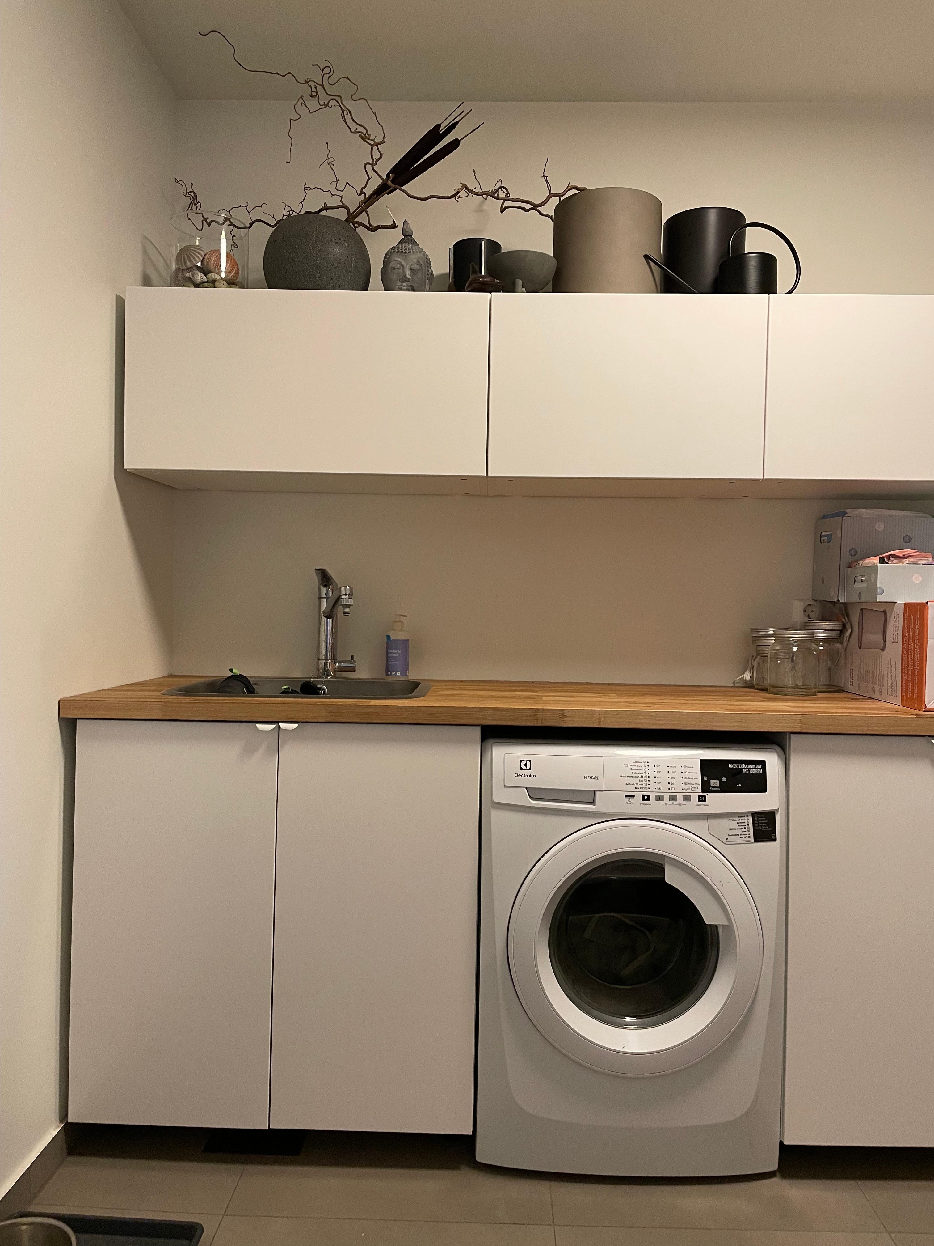 Vaskerom med tilgang fra kjøkkenet.