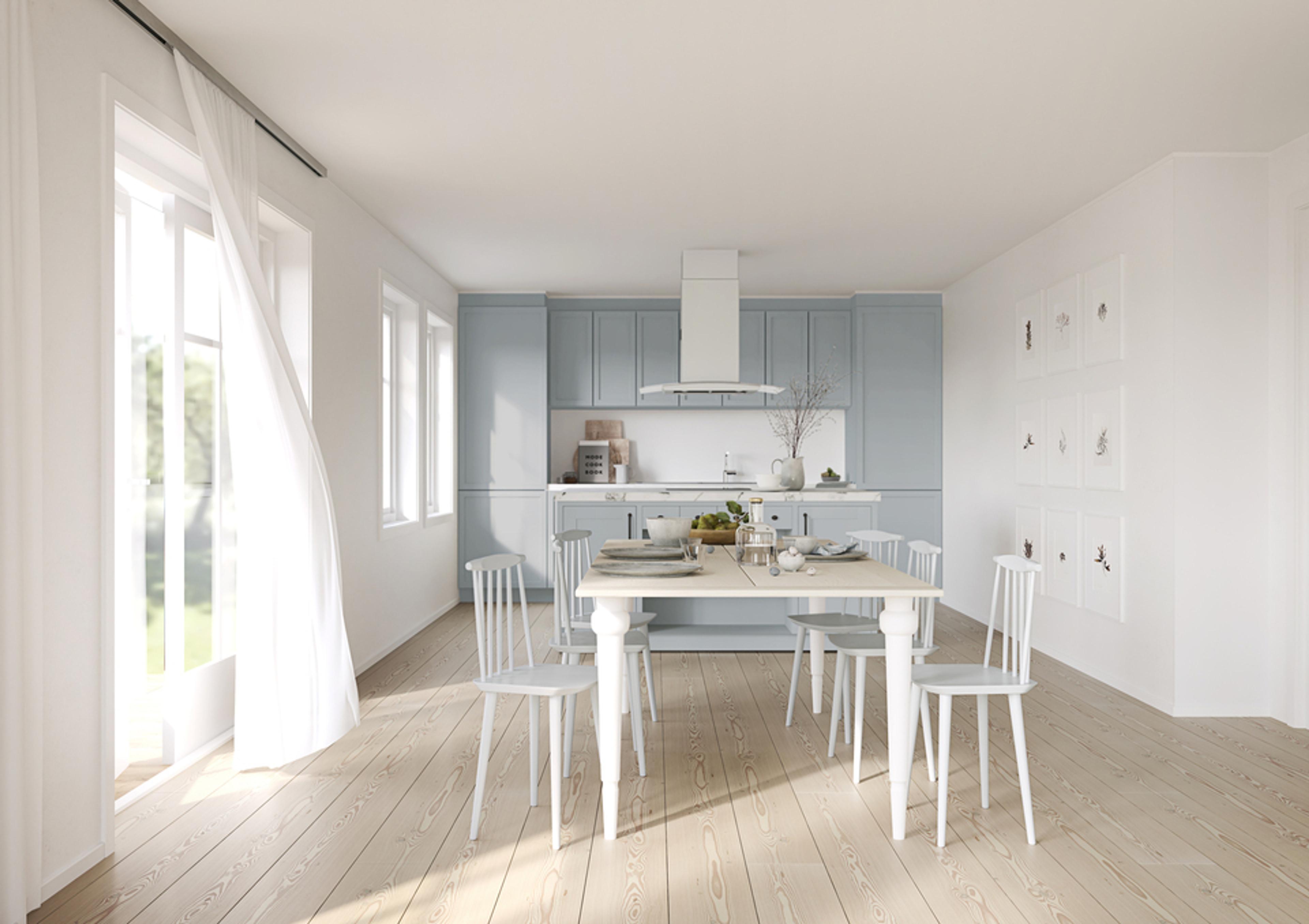Et lyseblått kjøkken med hvite vegger og et spisebord med seks stoler