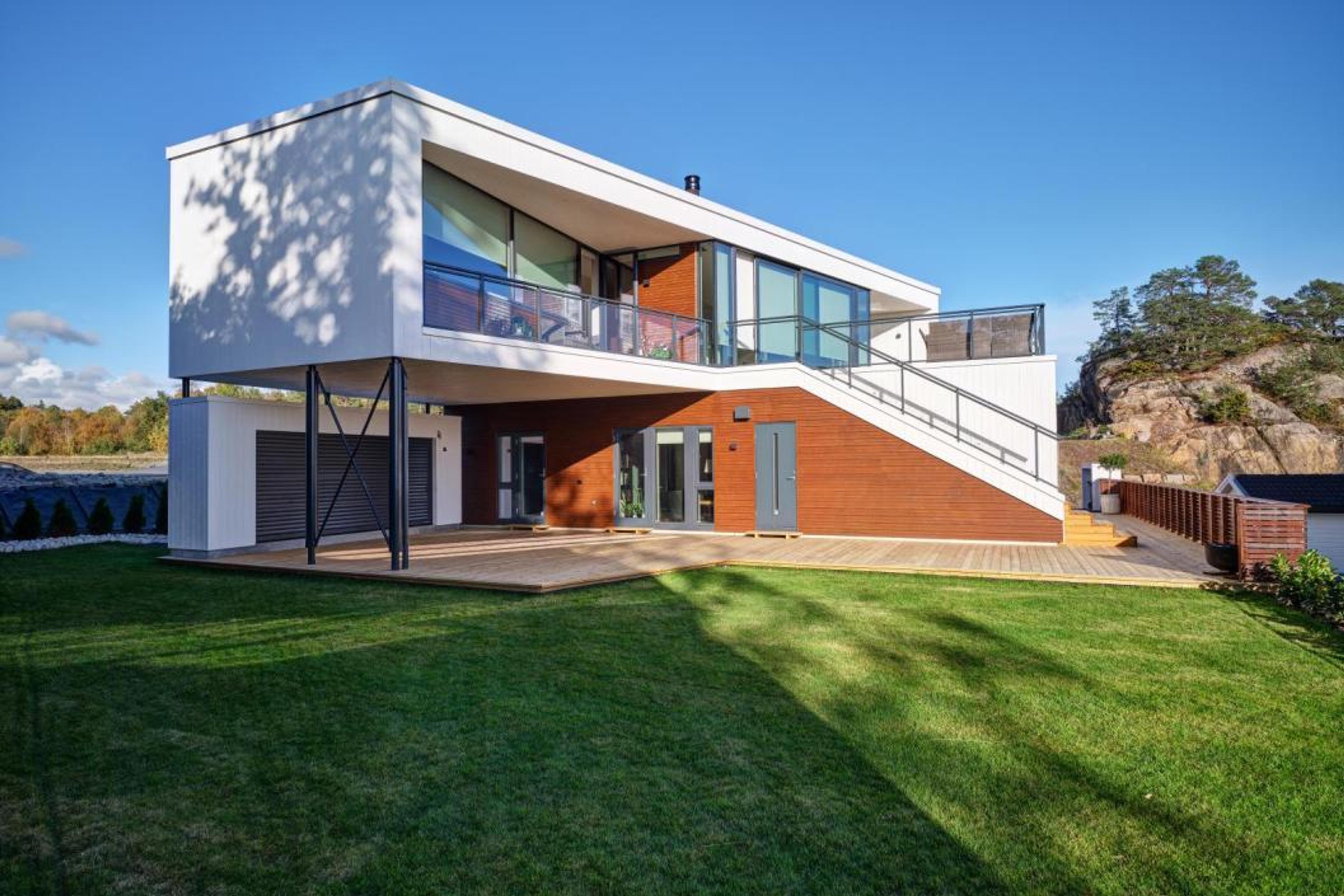 Bilde av moderne funkispreget arkitekttegnet hus levert av Nordbohus.