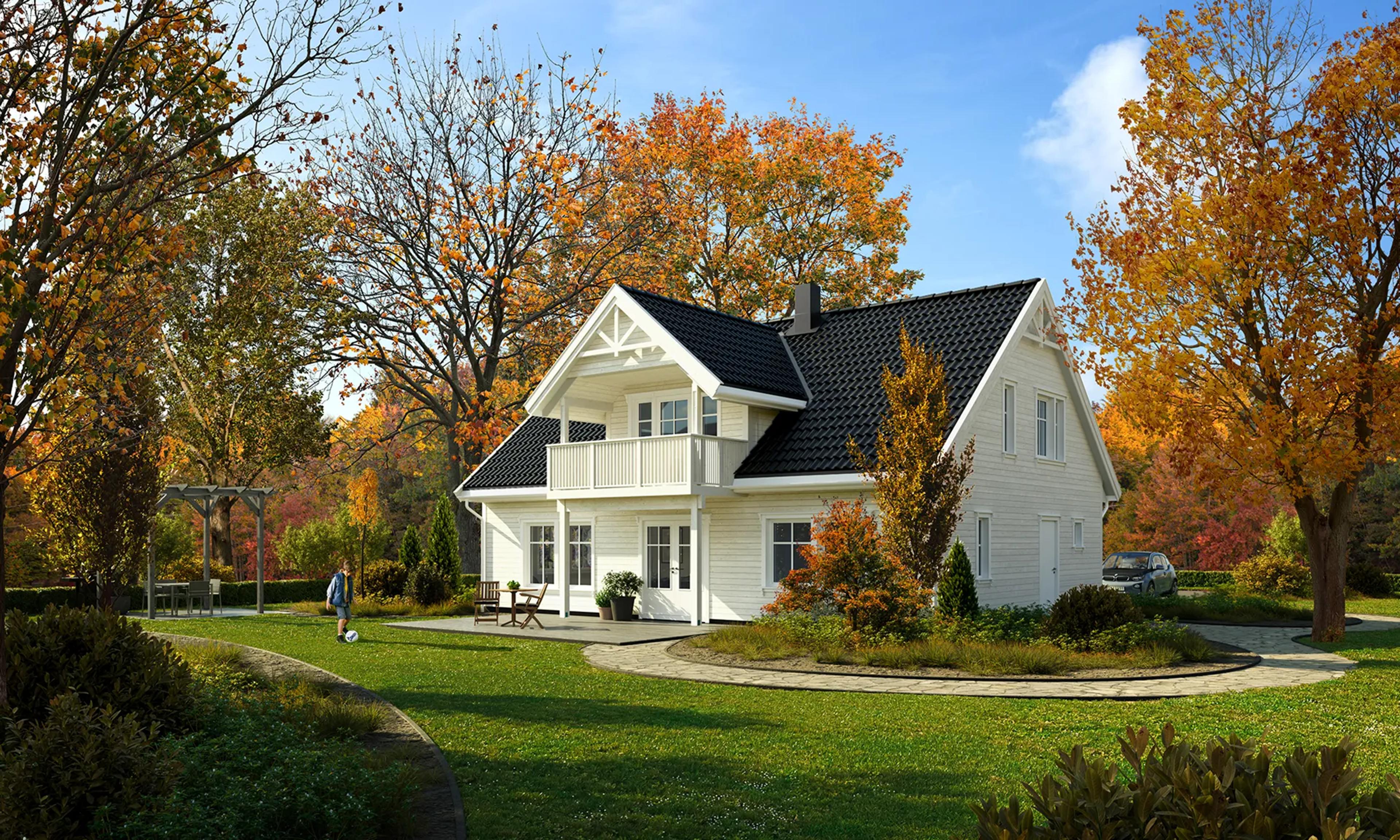 Hvitt, klassisk hus over to etasjer med skråtak