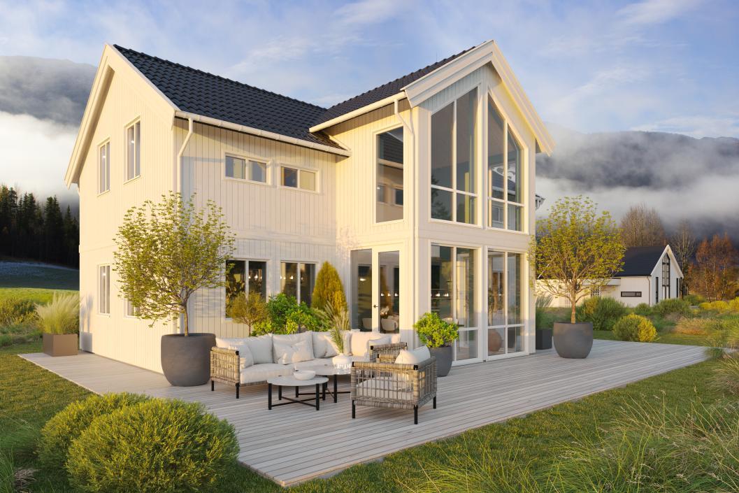 Hvitt, klassisk hus med svart tak