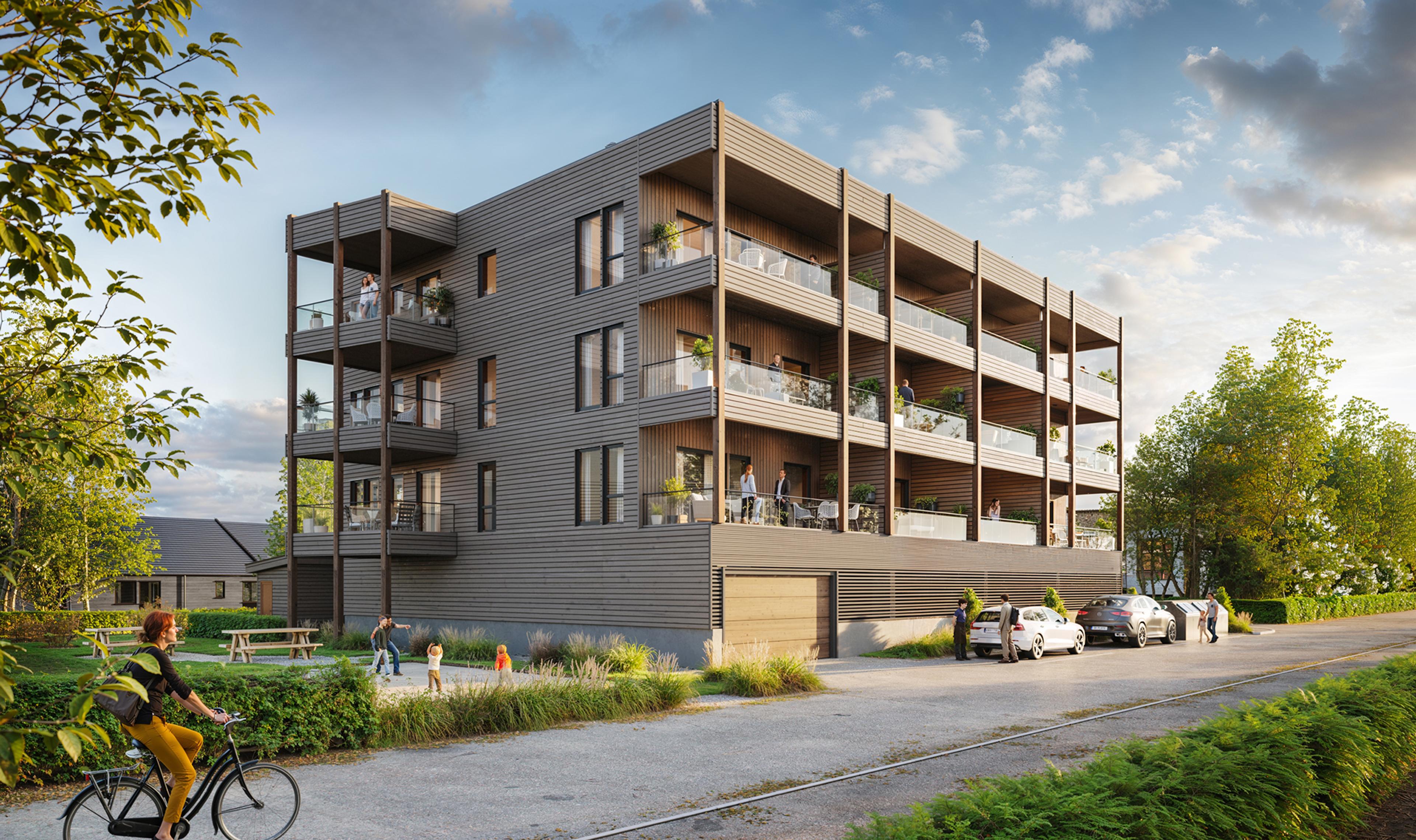 Moderne leilighetsbygg med glassrekkverk