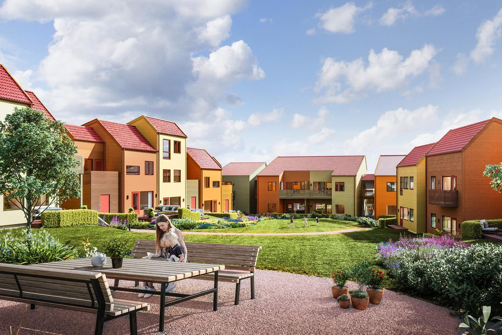 Fargerike rekkehus med frodig bakgår