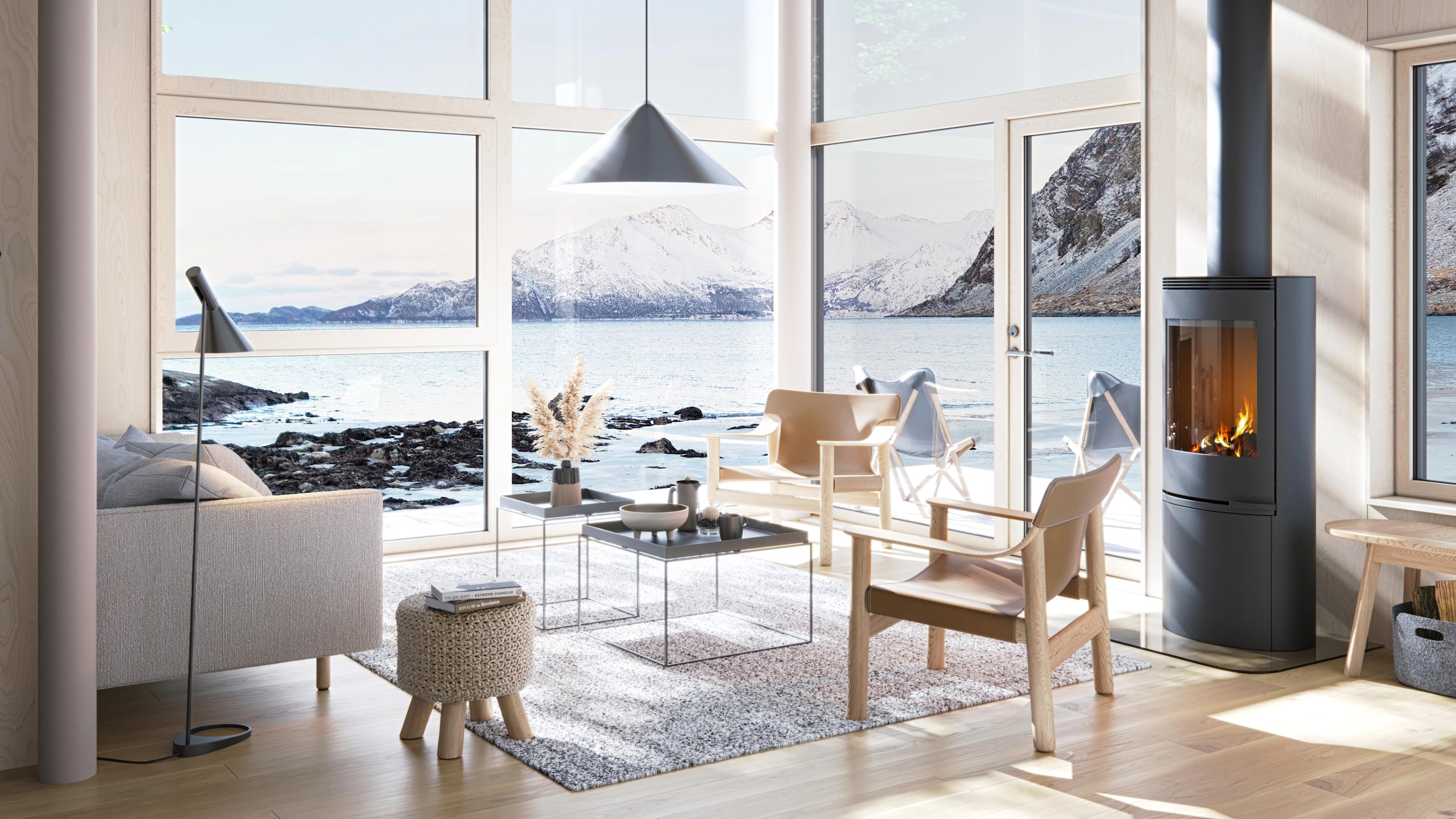 Lys og moderne hyttestue med utsikt mot havet