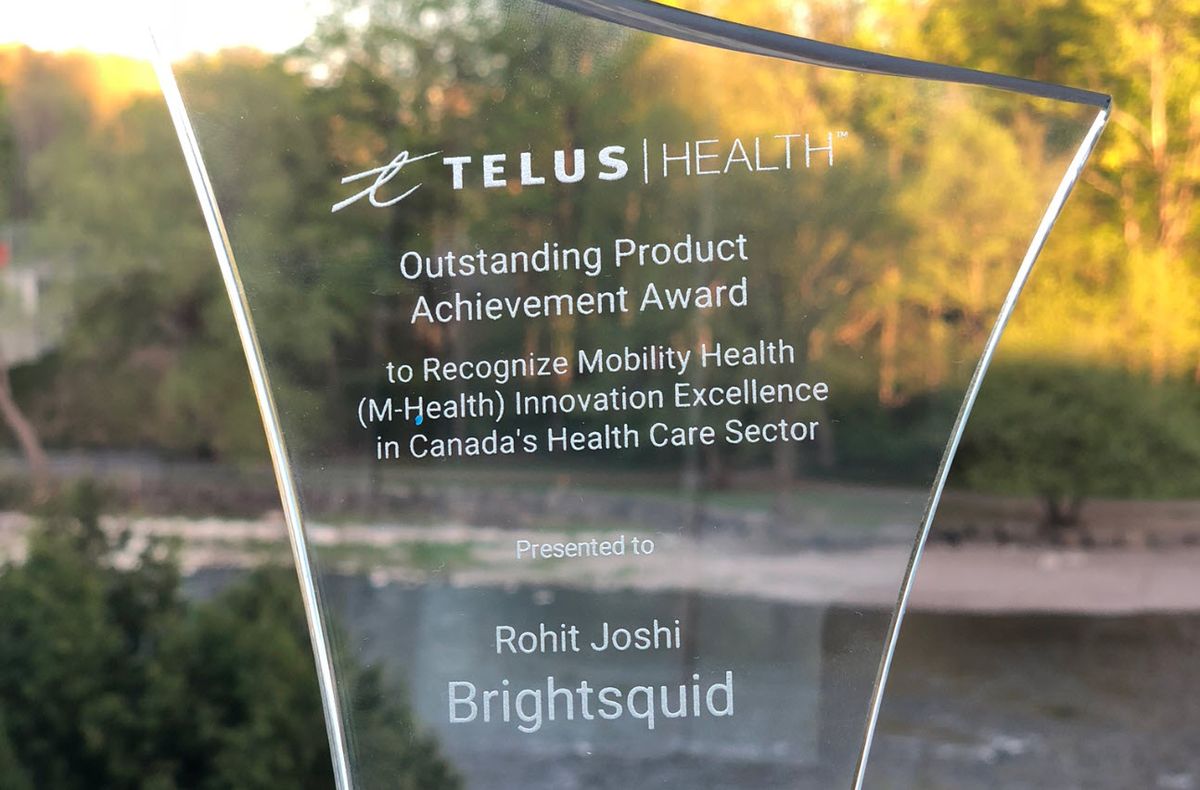 The TELUS Health Outstanding Product Achievement Award, engraved to Rohit Joshi, Brightsquid