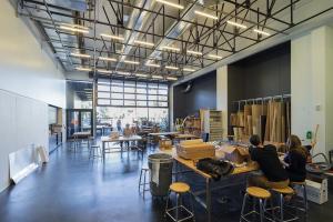 Glass-enclosed loading dock-fabrication shop