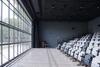 120-seat multi-purpose theater with operable garage door