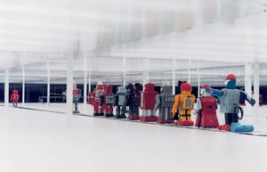 Robots on 300' conveyor belt