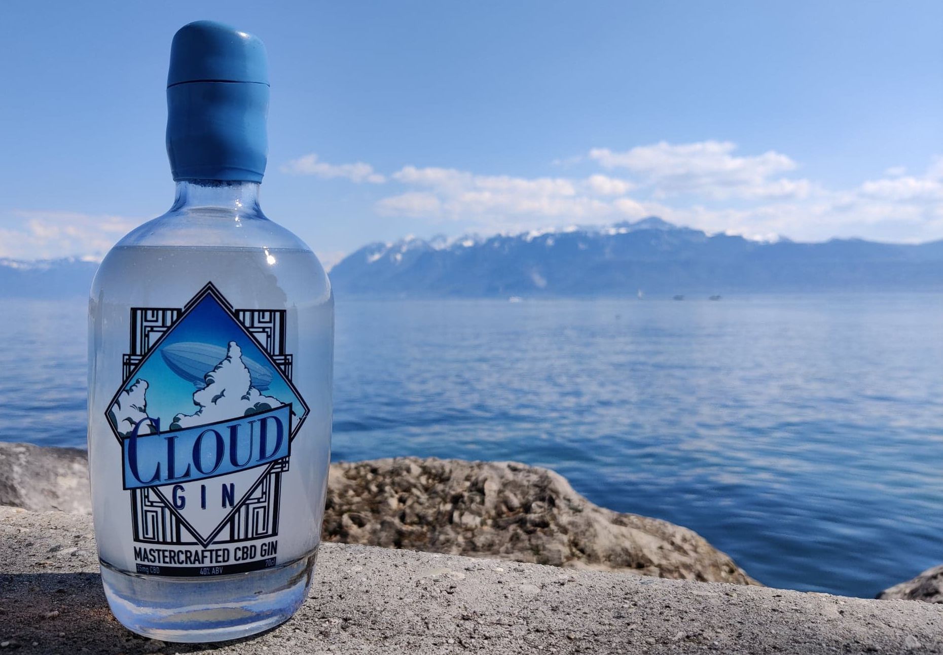 Cloud Gin infront of Lake Geneva