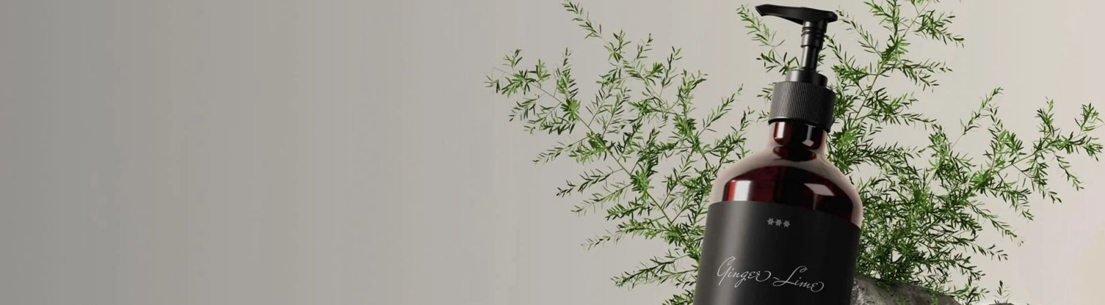Bedruckte Flüssigseife vor Steinen und Blättern
