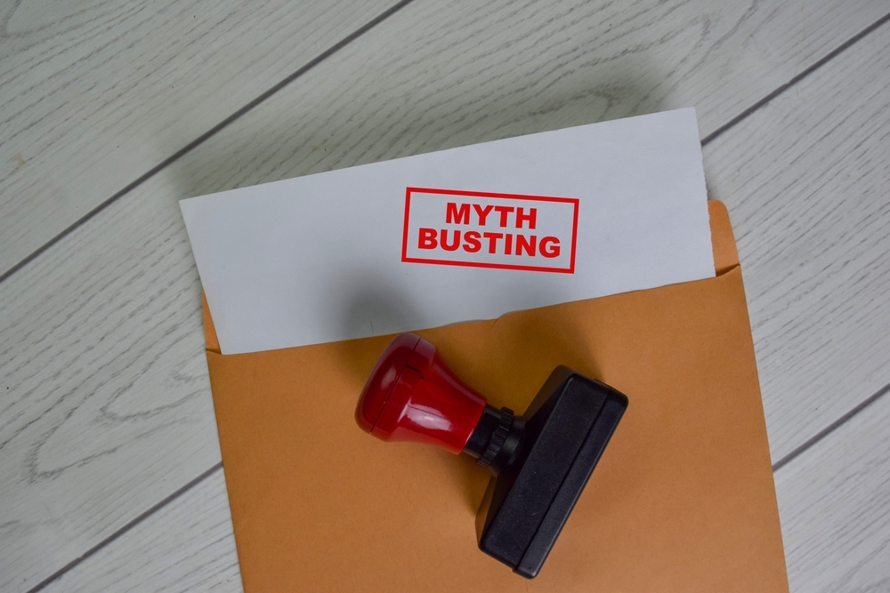 Image Myth busting concept about personal injury settlements and who pays compensation after an accident