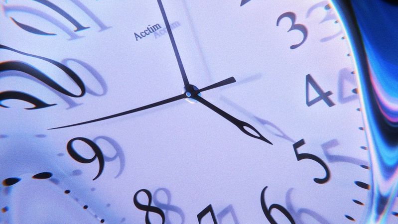 The image features a distorted view of a wall clock, showcasing its face with numbers clearly visible. The abstract distortion adds a surreal and artistic effect to the depiction of time.