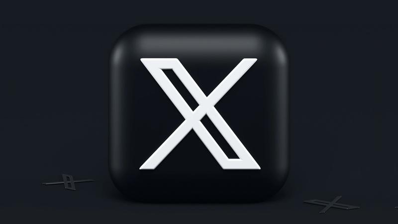 A stylized emblem of the letter 'X' displayed on a dark background, suggesting modern design elements. The logo conveys a sense of digital innovation.