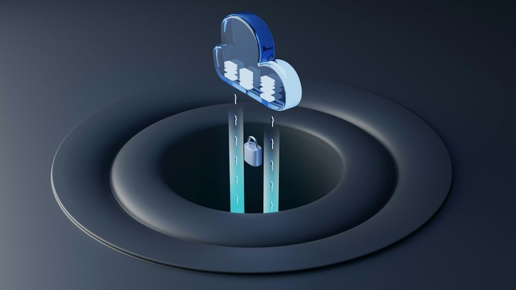 The image features a stylized representation of a cloud symbol with data streams flowing down into a secure lock positioned in a circular base. This visual metaphor depicts themes of cloud computing and data security. — Credit: Photo by Growtika on Unsplash