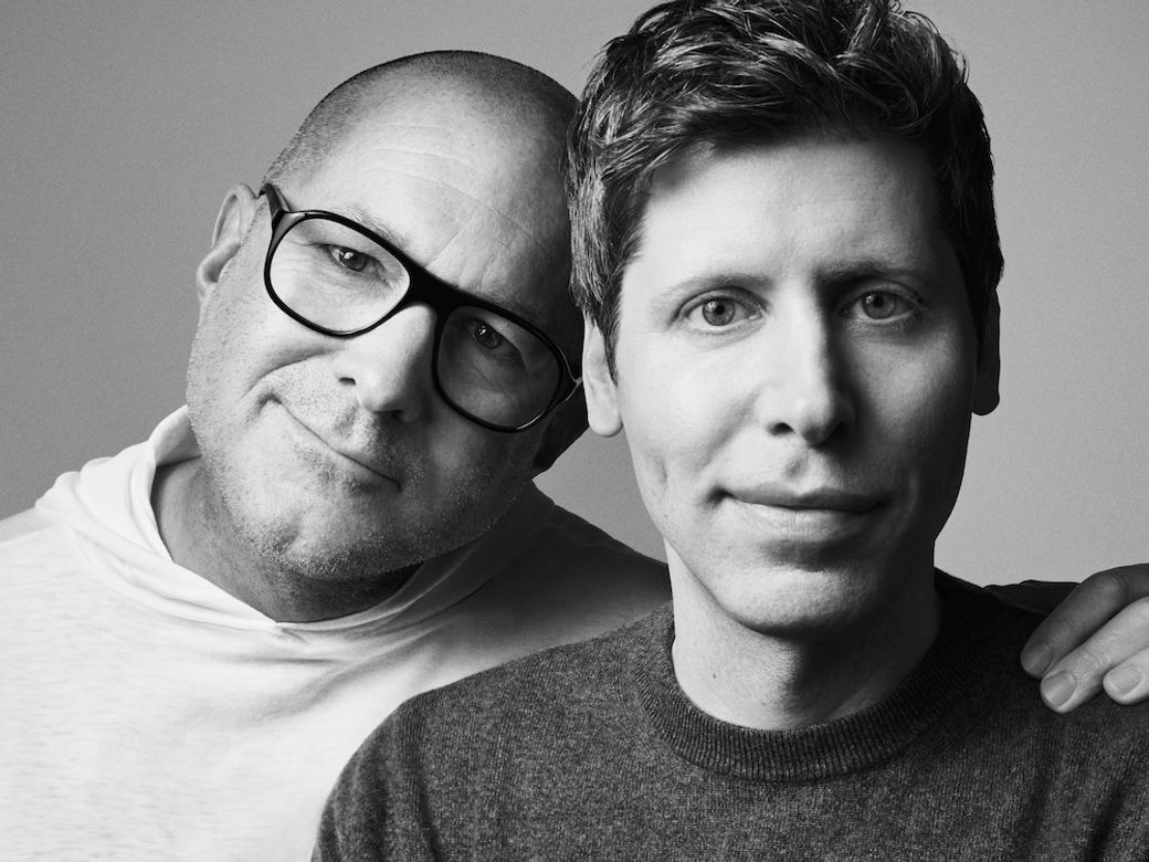 The image features two men closely positioned, with one wearing glasses and a white hoodie, and the other in a gray sweater. Their facial expressions convey a sense of camaraderie and engagement, suggesting a collaboration between prominent figures in design and technology.