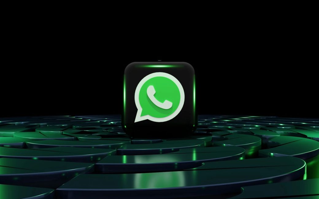 The image features a prominent green WhatsApp logo set against a dark backdrop, surrounded by a swirling maze-like pattern. The design emphasizes a modern and digital aesthetic, focusing on the communication application. — Credit: Photo by BoliviaInteligente / Unsplash