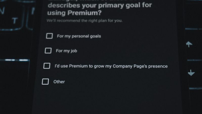 The image shows a close-up of a digital questionnaire or survey on a mobile device. It asks the user about their primary goal for using a service called Premium, with multiple choice options displayed.