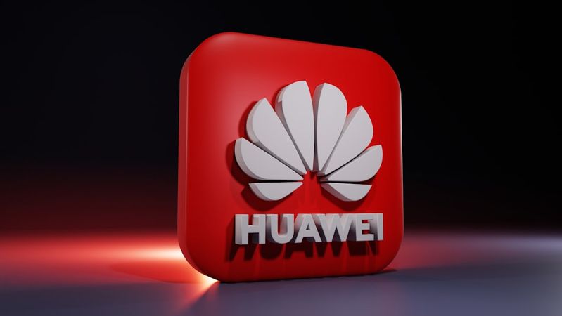 The image features a three-dimensional rendering of the Huawei logo set against a dark background. The logo prominently displays the company's name and its iconic flower-like symbol.