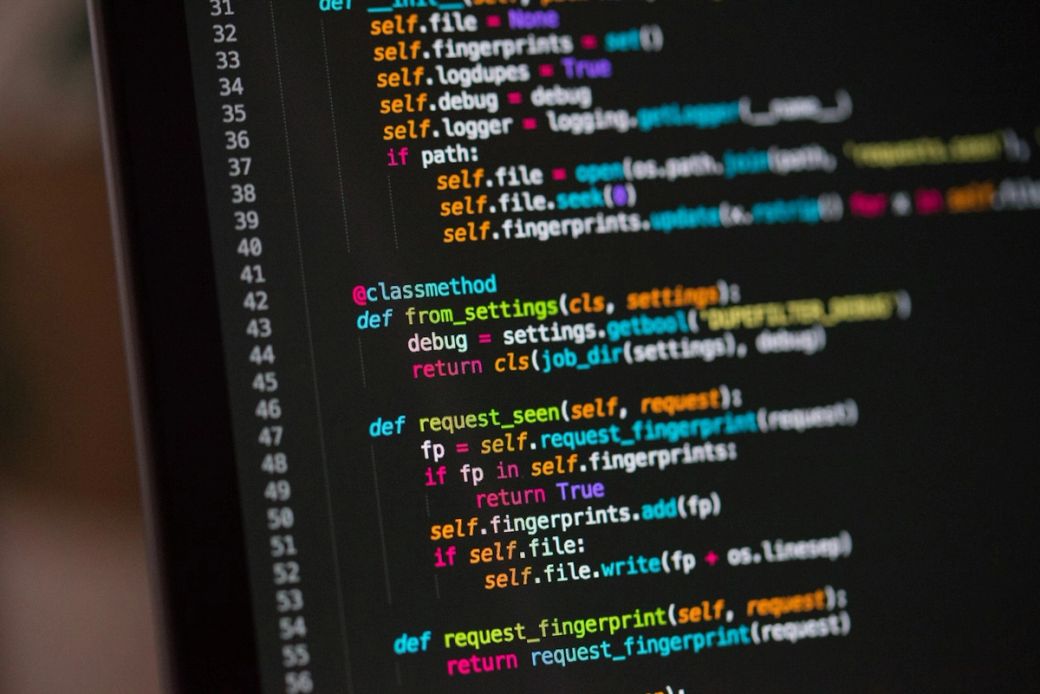 The image displays a close-up view of computer code written in Python, showcasing a method definition with colorful syntax highlighting. The code appears to involve settings management and fingerprinting functionalities. — Credit: Photo by Chris Ried / Unsplash