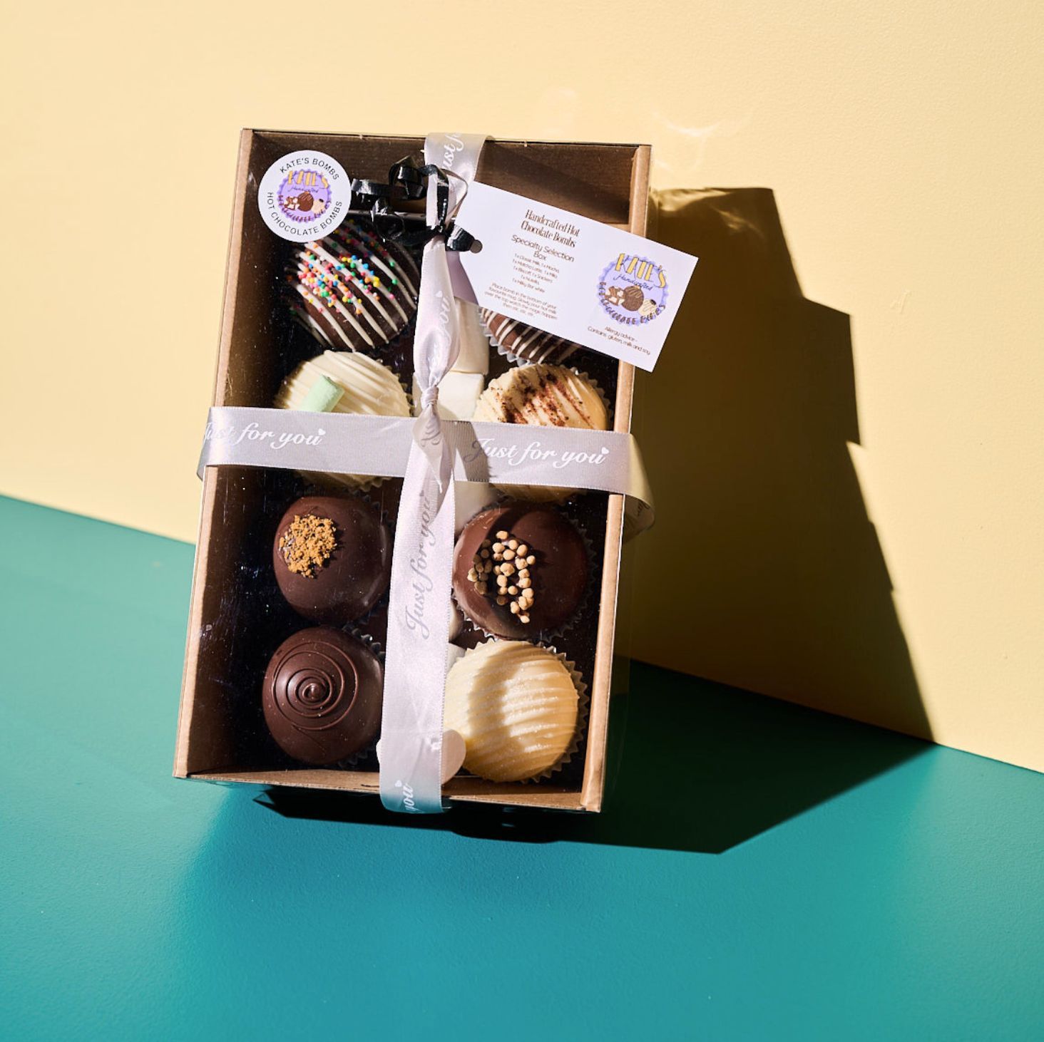 Specialty selection of hot chocolate bombs from Kate's Bombs for gifts under $100
