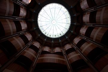 Unprocessed RAW photo showing dark shadows, lost details, blown highlights, and dull colors before editing