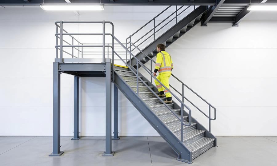 Mezzanine stairs requirements: IBC vs OSHA, explained with the actual numbers
