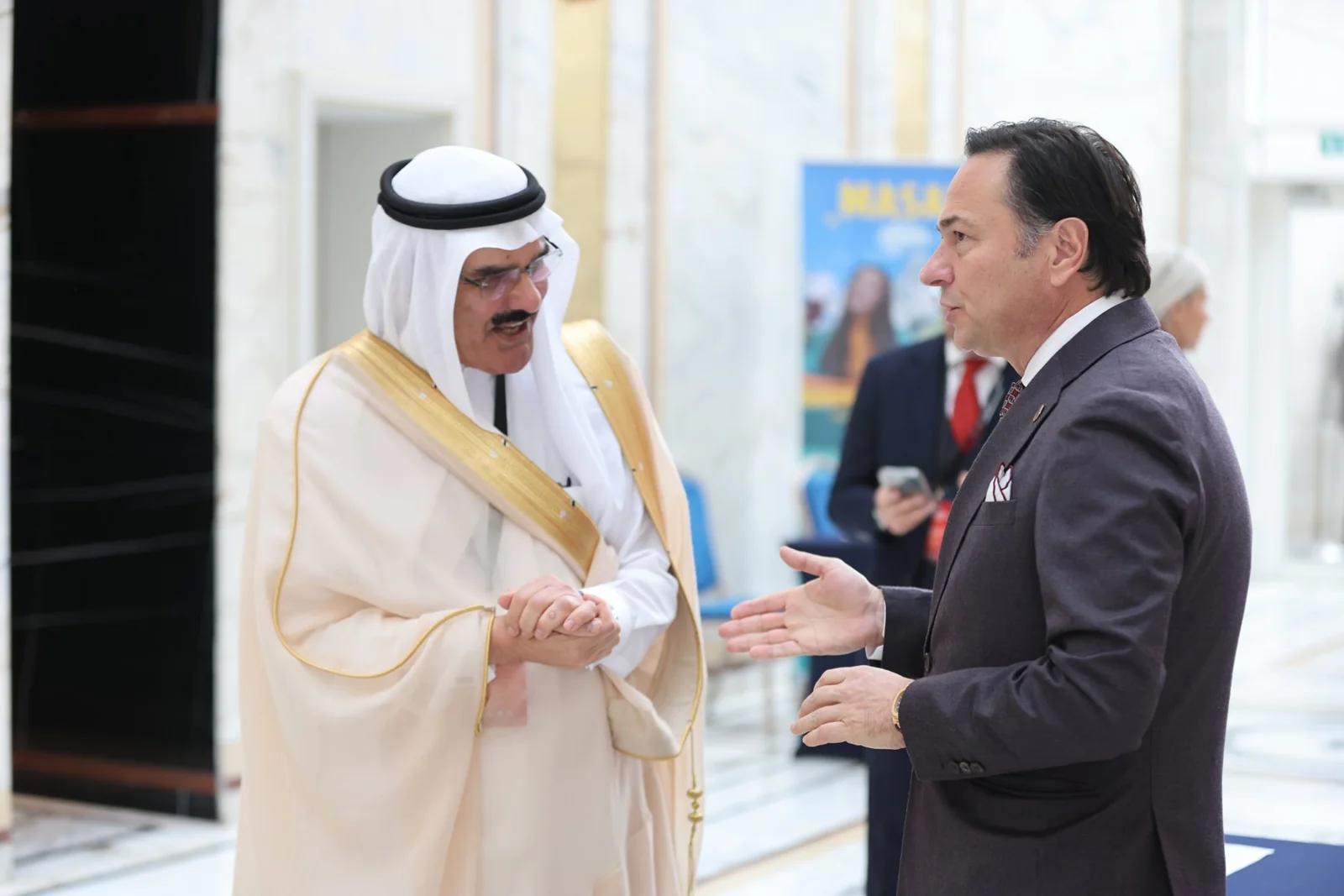 Two delegates talking in the foyer at GIF Georgia 2025.