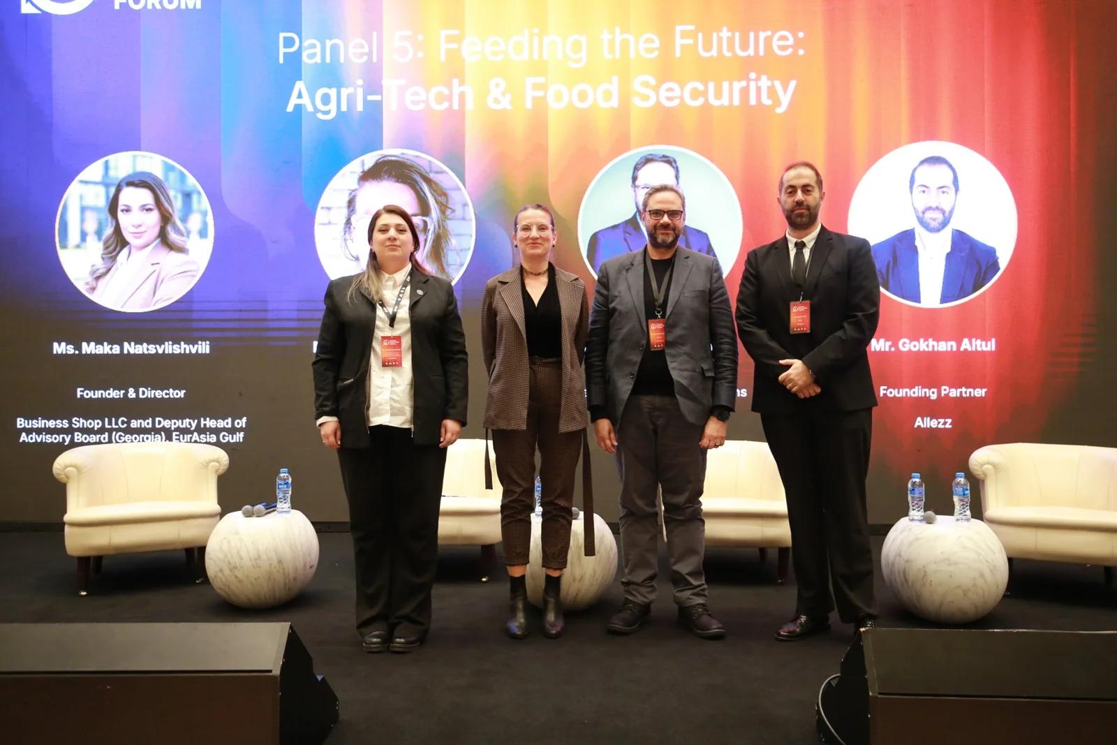 Participants on stage after a discussion at GIF Georgia 2025.
