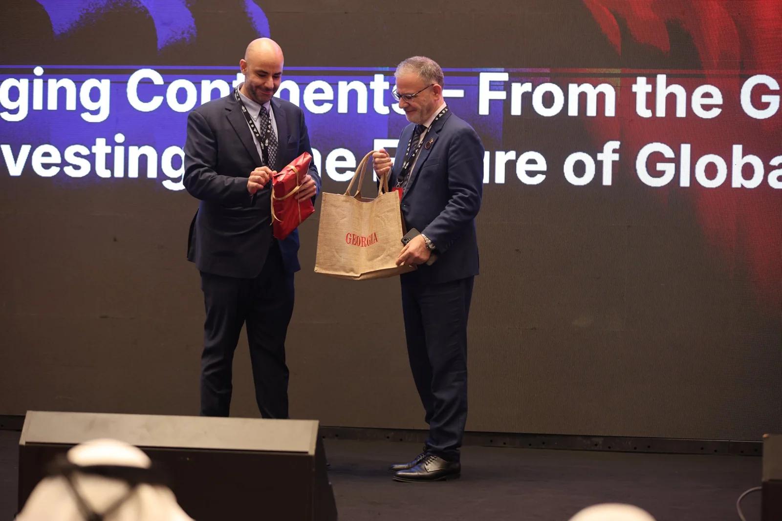 An exchange on stage at the close of a session at GIF Georgia 2025.
