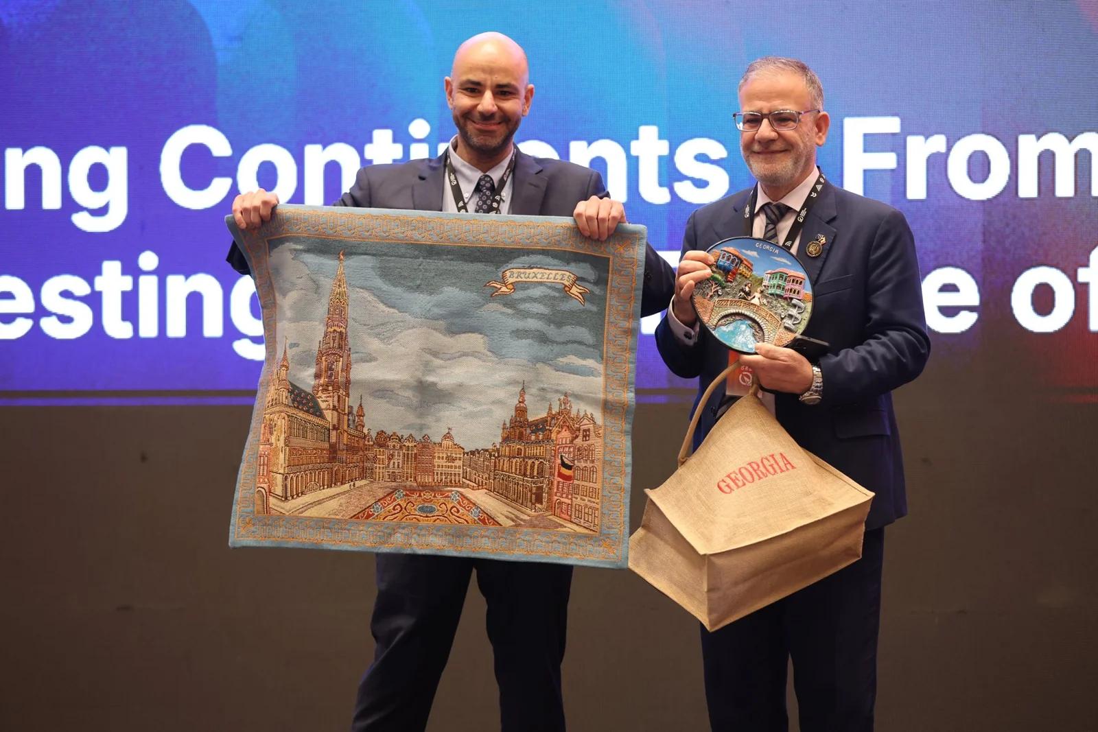 A gift presentation at the forum at GIF Georgia 2025.