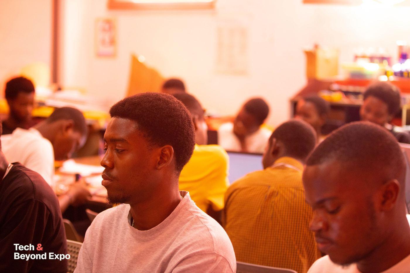 Participants working on laptops during a hands-on session