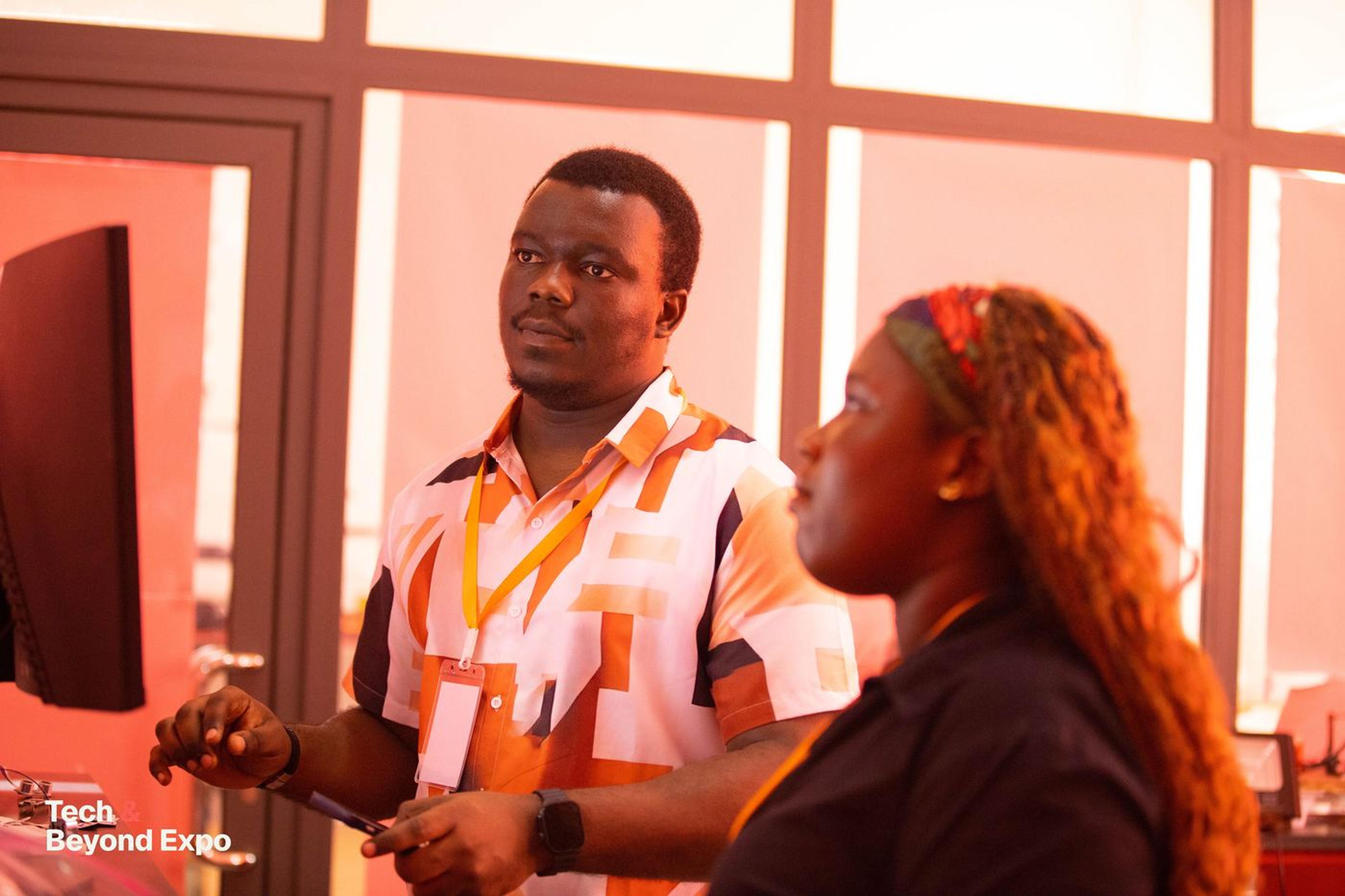 Two instructors guiding a hands-on session