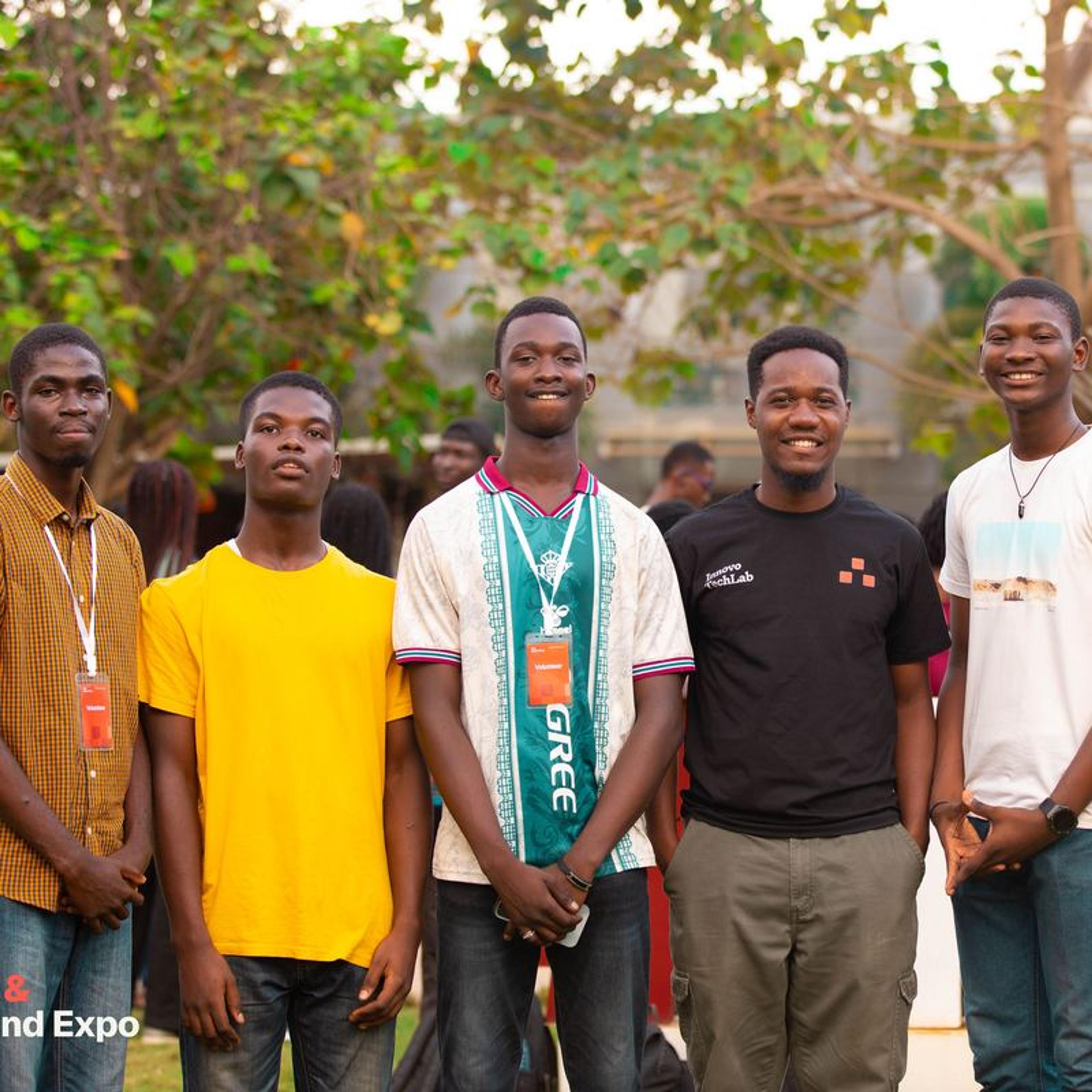 A group of students smiling together outdoors