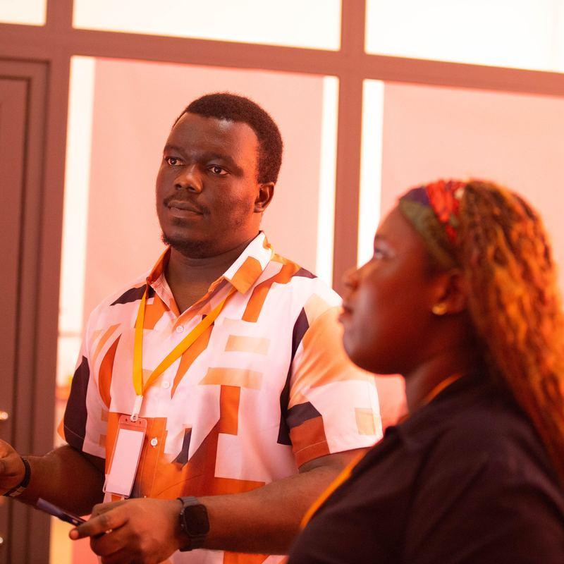 Two instructors guiding a hands-on session
